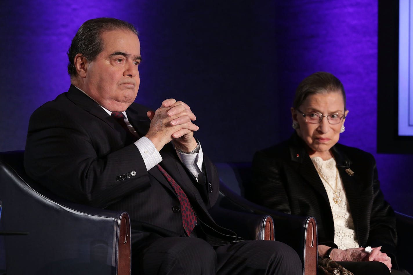 Supreme Court Justices Antonin Scalia, left, and Ruth Bader Ginsburg wait for the beginning of the taping of "The Kalb Report," April 17, 2014, at the National Press Club in Washington, D.C. (Alex Wong/Getty Images/TNS) ORG XMIT: 1773787