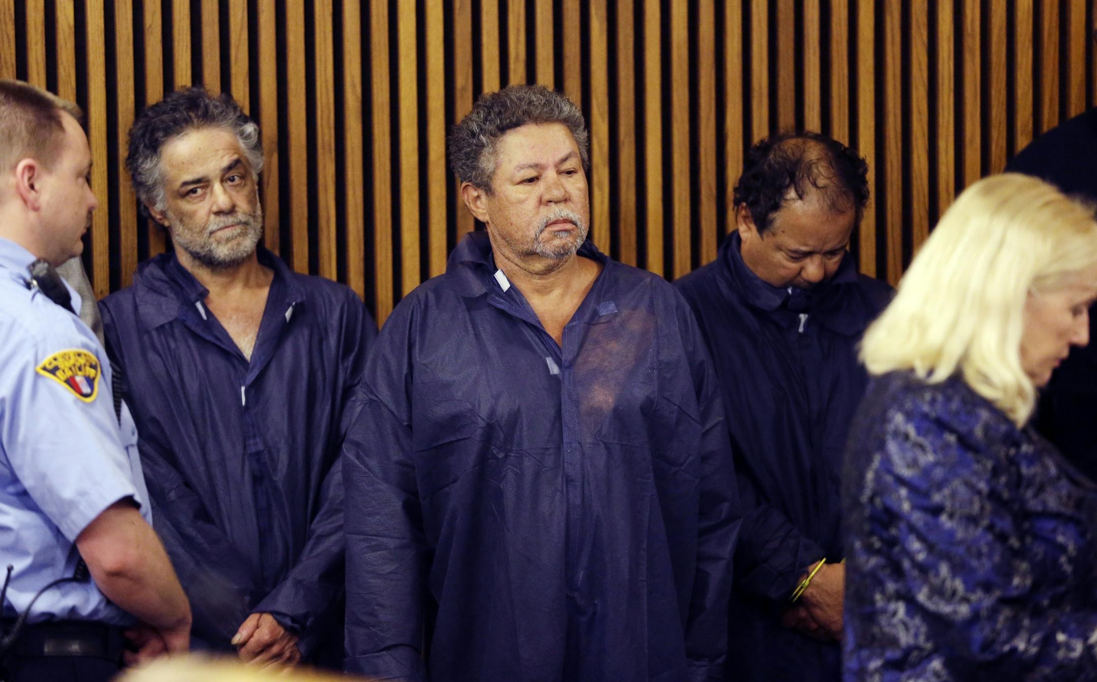 Onil Castro, left, Pedro Castro, center, and Ariel Castro, right, wait for their arraignment at Cleveland Municipal Court in Cleveland, Ohio, Thursday, May 9, 2013. Ariel Castro was charged with four counts of kidnapping and three counts of rape. Pedro and Onil Castro, were held but faced no immediate charges.