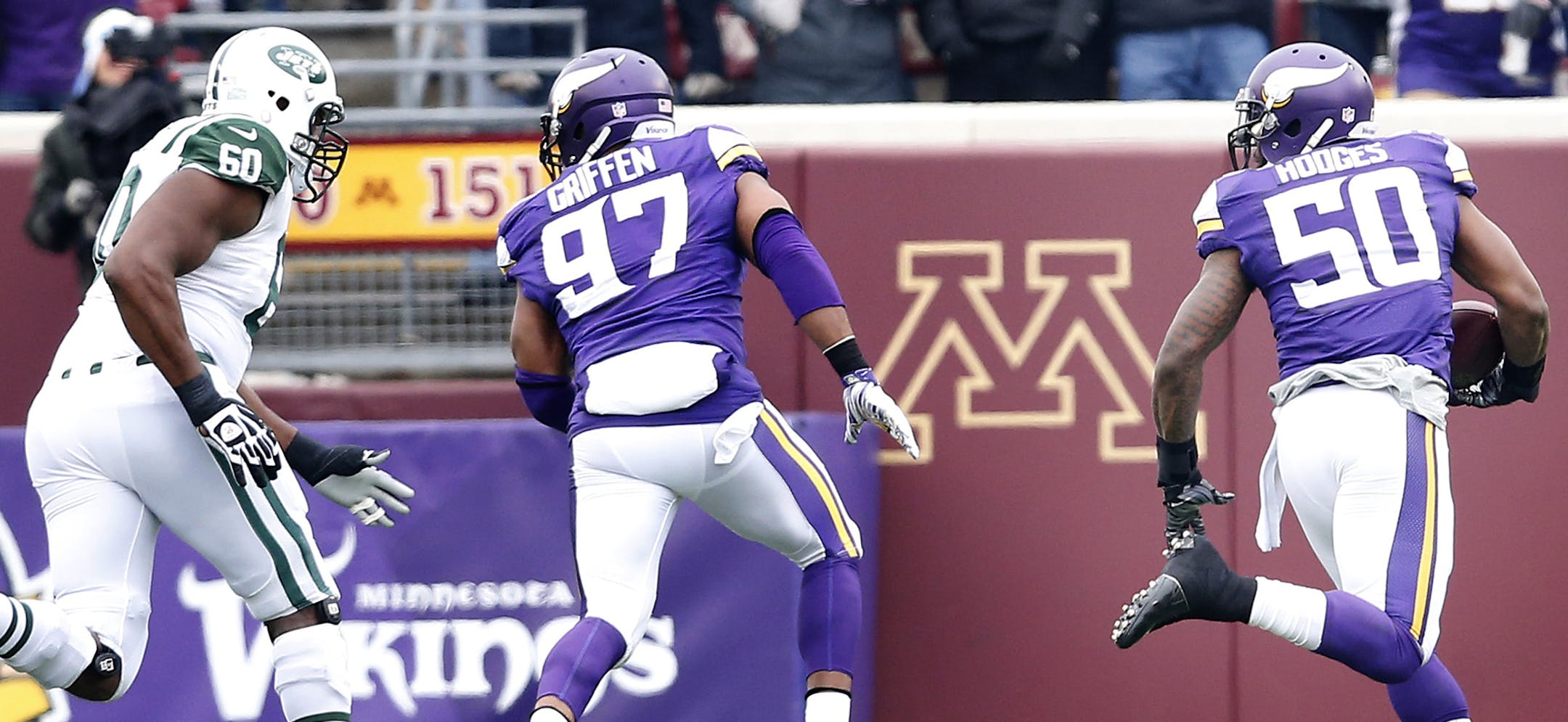 Vikings linebacker Gerald Hodges (50) intercepted Geno Smith pass and returned it 27-yards for a touchdown in the first quarter. ] CARLOS GONZALEZ cgonzalez@startribune.com - December 7, 2014 ‚Äì Minneapolis, Minn., TCF Bank Stadium, NFL, Minnesota Vikings vs. New York Jets