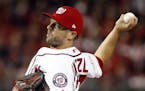 Washington Nationals relief pitcher Brandon Kintzler throws during the sixth inning in Game 5 of baseball's National League Division Series against th