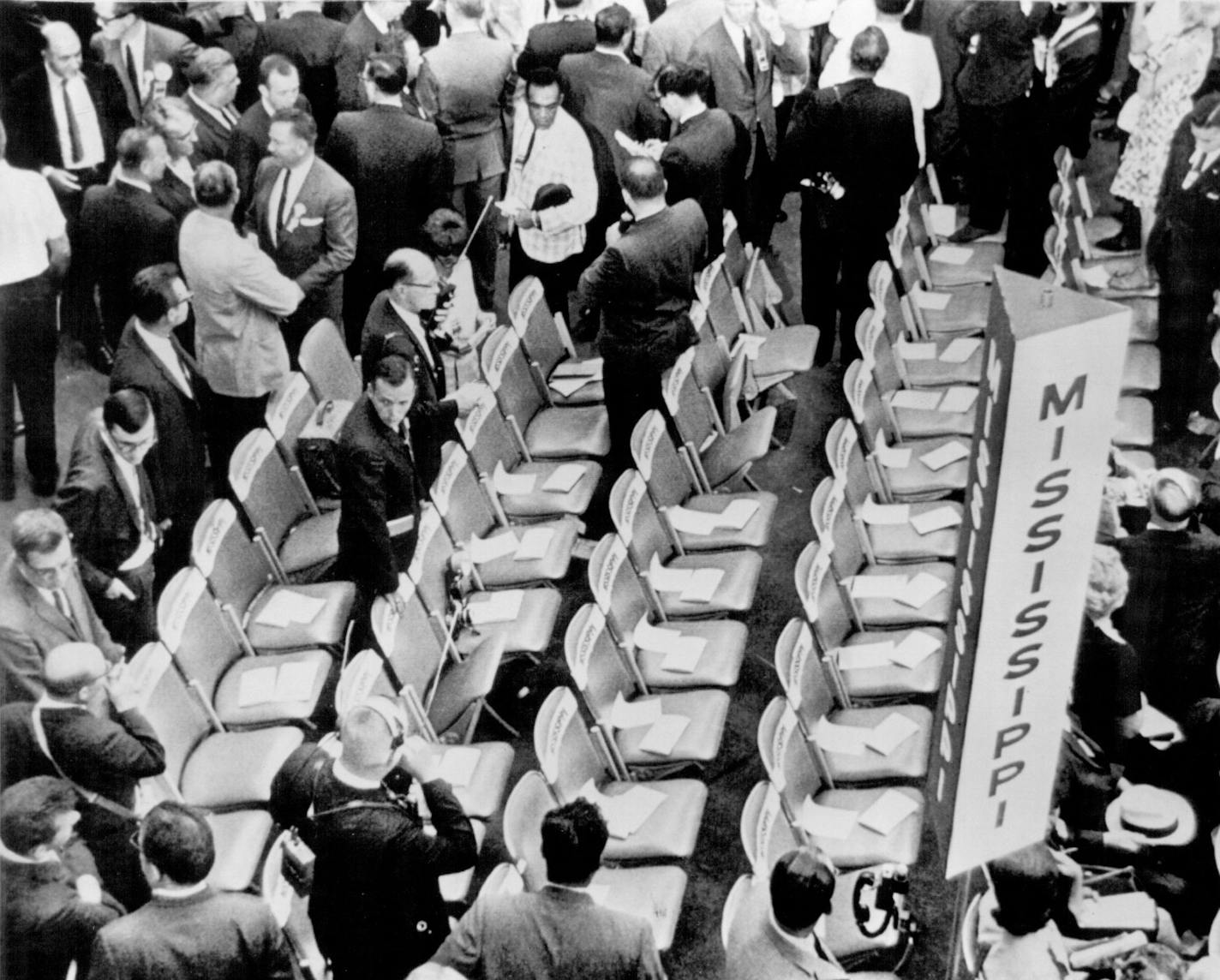 August 26, 1964 Seats, assigned to the Mississippi delegation to the Democratic National Convention were unoccupied Tuesday night just before start of the session. Later Mississippi filled only three of the seats, under orders from Gov. Paul D. Johnson of that state to walk out. The regular all-white delegation from Mississippi announced it was going home rather than accept a compromise in the fight over whether it or a competing Negro delegation should be seated. AP Wirephto