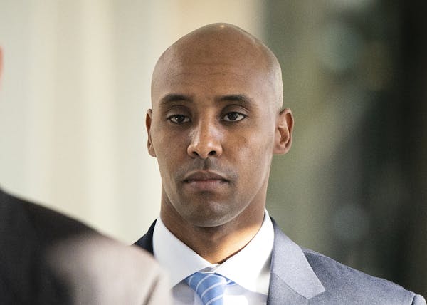 FILE - In this Friday, April 26, 2019, file photo, former Minneapolis police officer Mohamed Noor walks to court in Minneapolis.