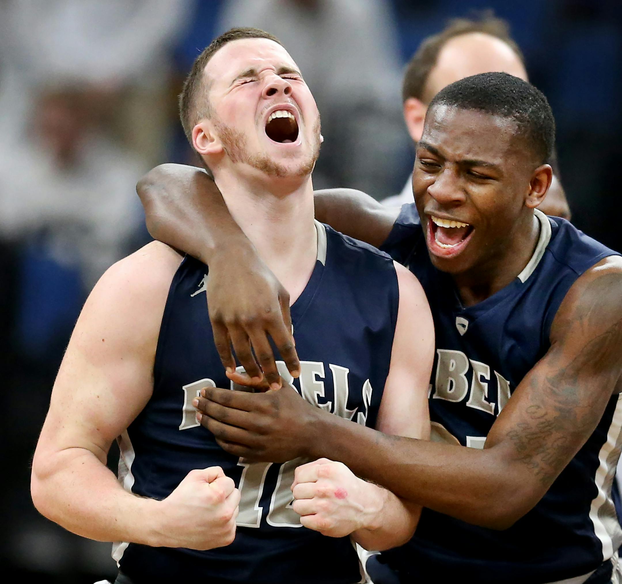 Sam Dubois left of Champlin celebrated his winning 3 point basket with teammate McKinley Wright during quarterfinal class 4A basketball action at Target Center Wednesday March 22 2017 in Minneapolis, MN.] Chaska vs Champlin Park . JERRY HOLT &#xef; jerry.holt@startribune.com
