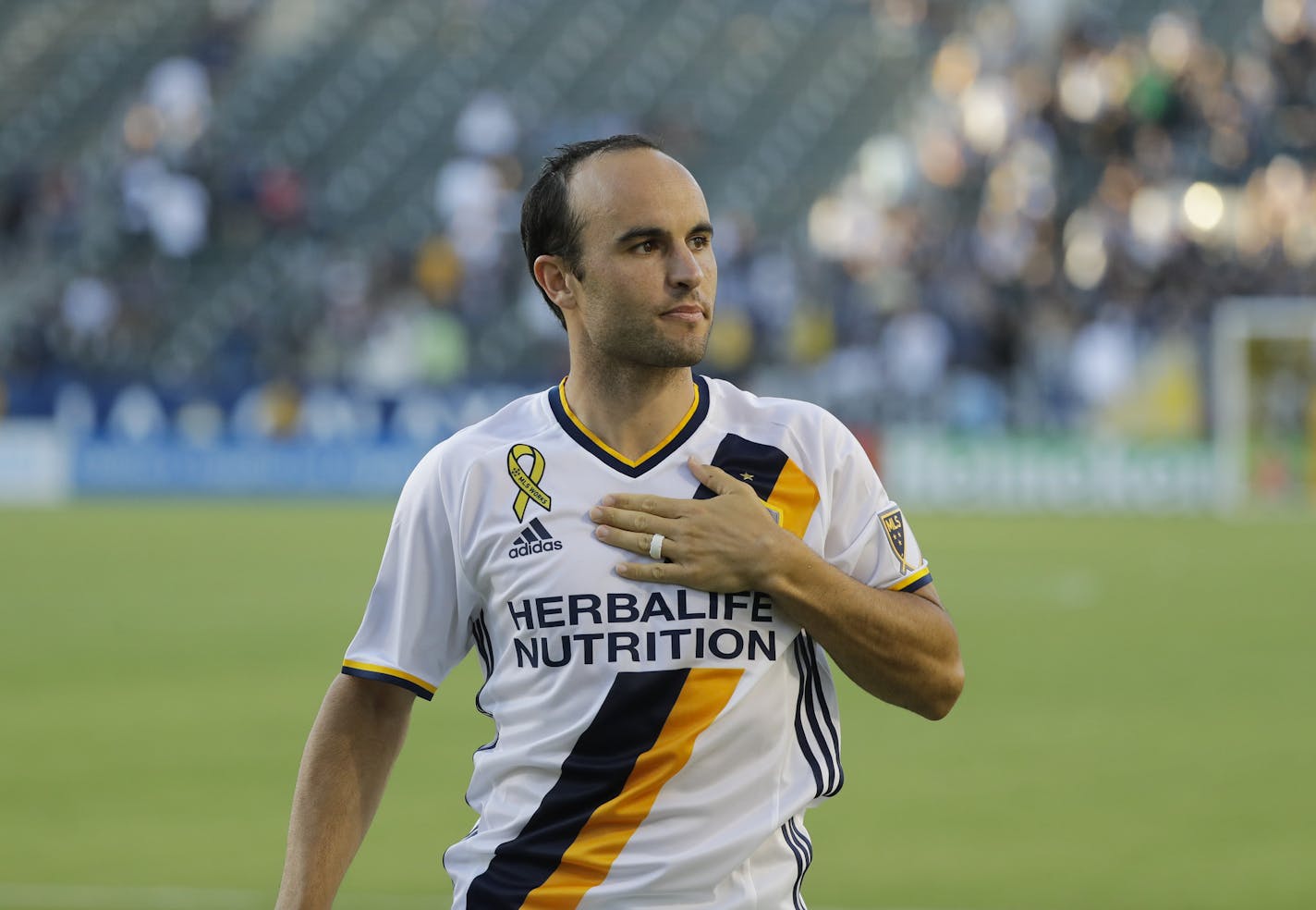 Los Angeles Galaxy's Landon Donovan acknowledges the fans after an MLS soccer match against the Orlando City FC on Sept. 11, 2016, in Carson, Calif. The Galaxy won 4-2.