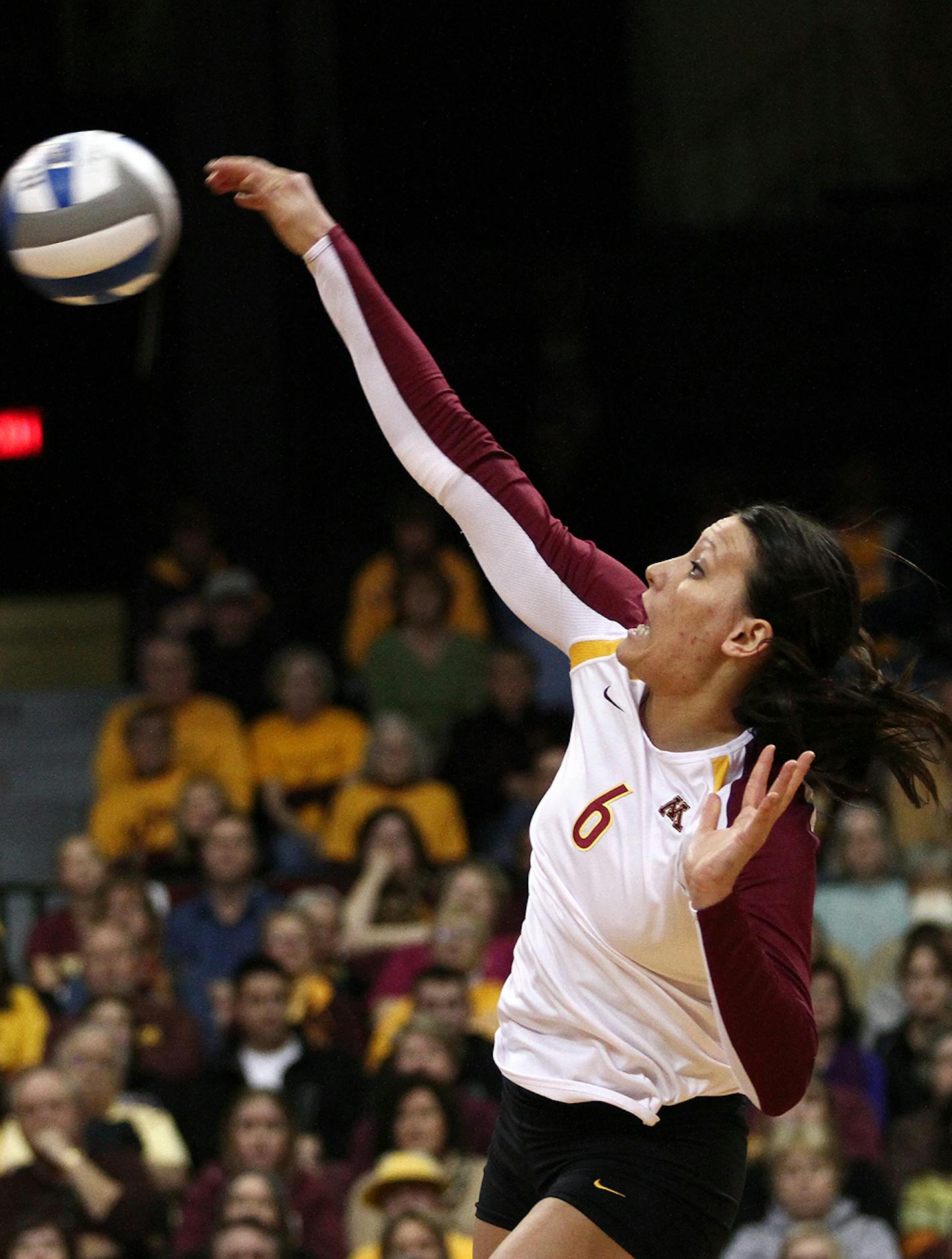 Minnesota's Tori Dixon jumped up to spike the ball against Liberty. ] MARISA WOJCIK - The University of Minnesota women's vollyball team played the Liberty Flames on Friday, November 30, 2012 at the Sports Pavilion in Minneapolis. ORG XMIT: MIN1211302057200242