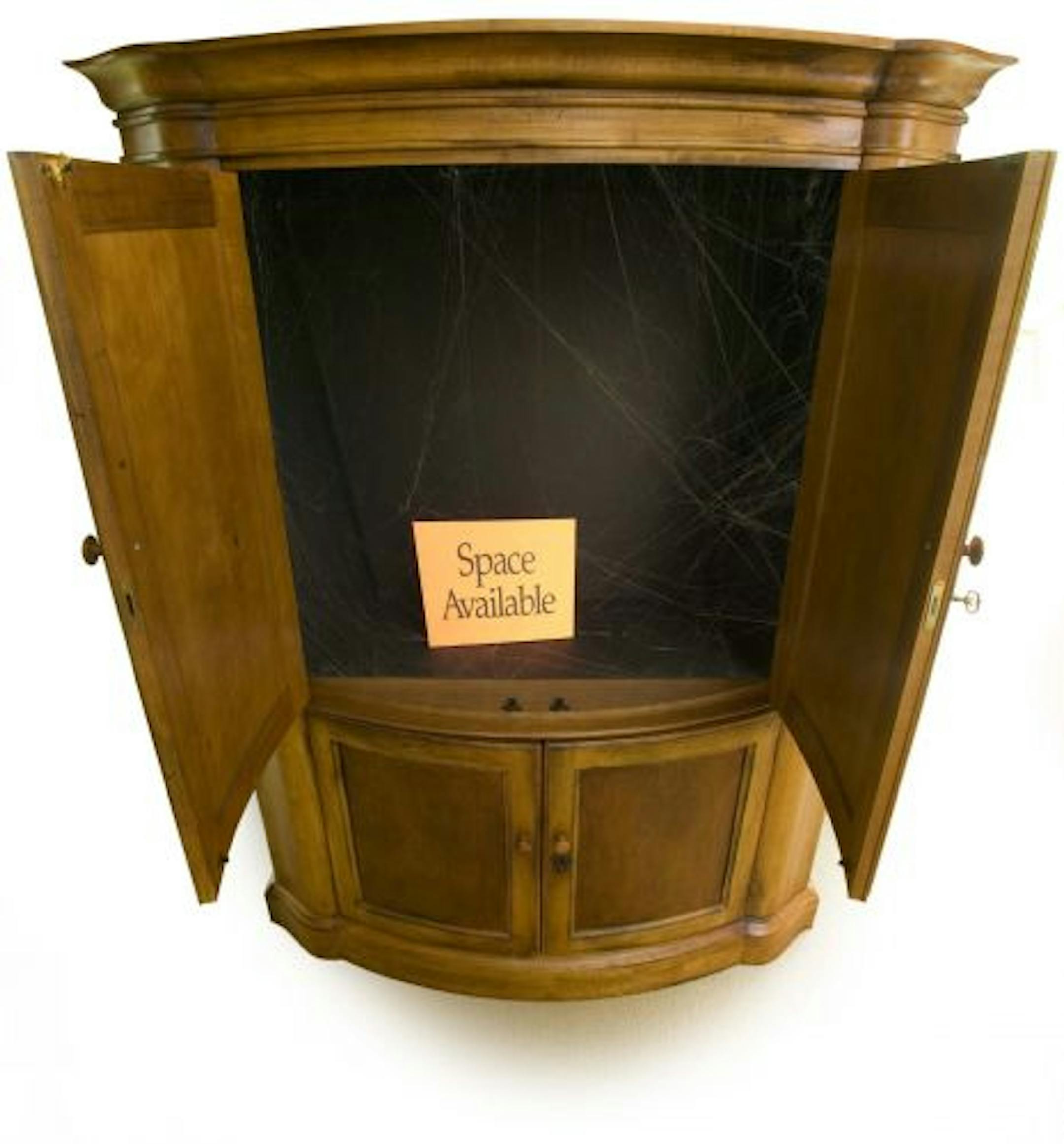 Before unloading a television armoire on the curb, think about how it can still be used.