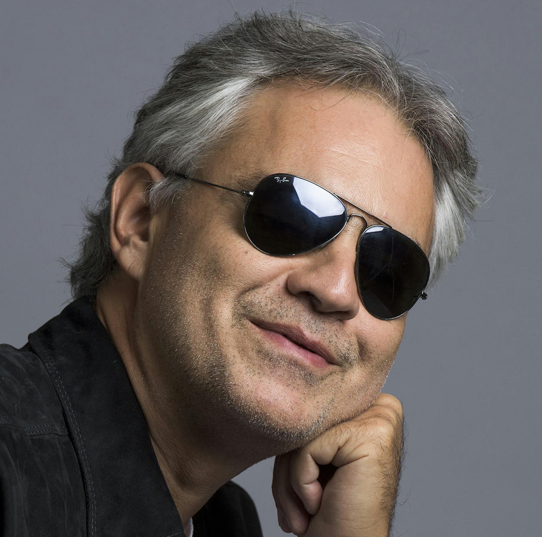 In this Oct. 29, 2015 photo, Andrea Bocelli poses for a portrait in New York. Bocelli has released an album, “Cinema,” which includes a duet with pop star Ariana Grande. (Photo by Drew Gurian/Invision/AP) ORG XMIT: INVW
