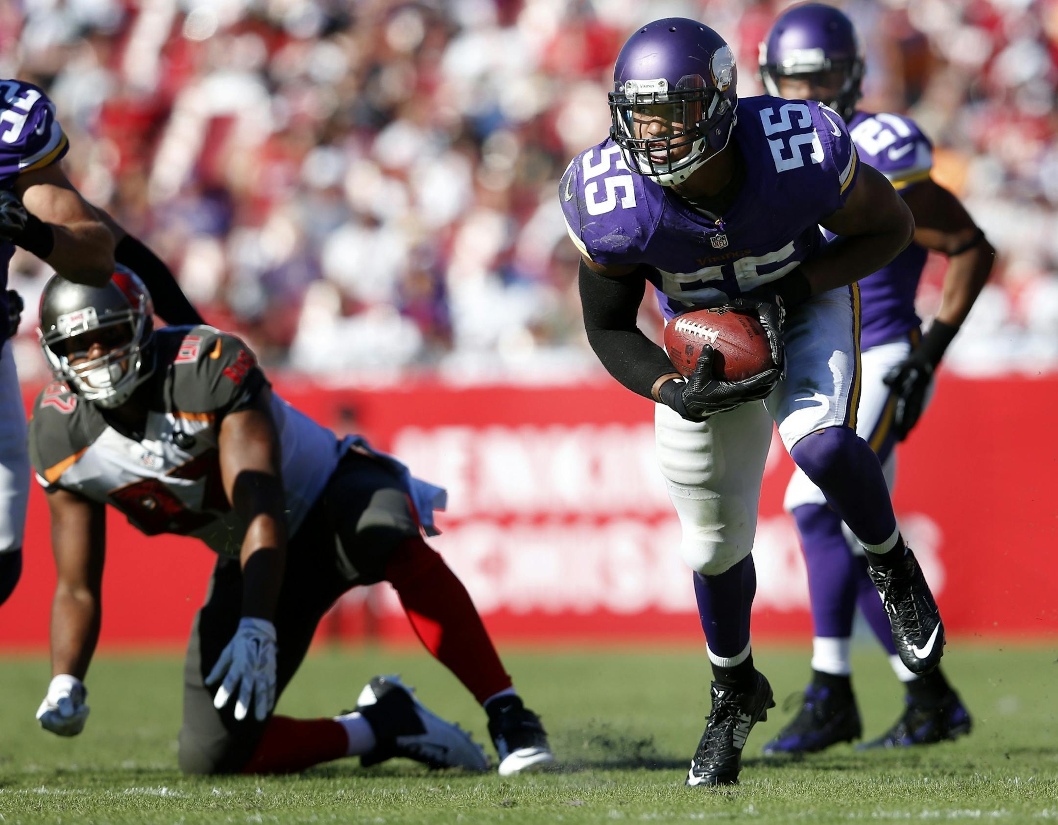 Minnesota Vikings linebacker Anthony Barr (55) returned a fumble by Austin Seferian-Jenkins (87) 27-yards for a touchdown to win the game in overtime.