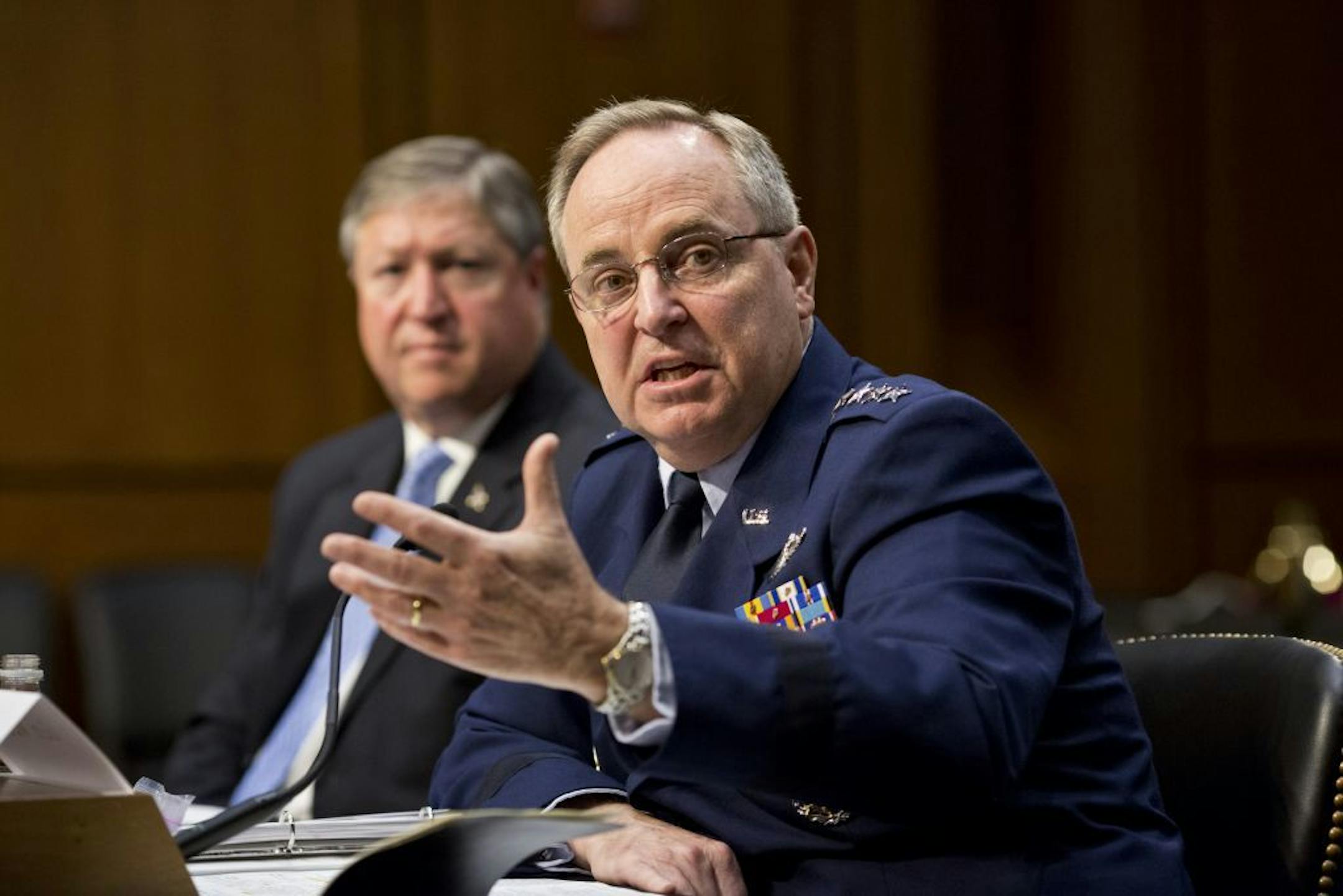 The Senate Armed Services Committee hears from top officials of the Air Force, Air Force Chief of Staff Gen. Mark A. Welsh III, right, and Secretary of the Air Force Michael B. Donley, left, during a hearing on Capitol Hill in early May 2013.