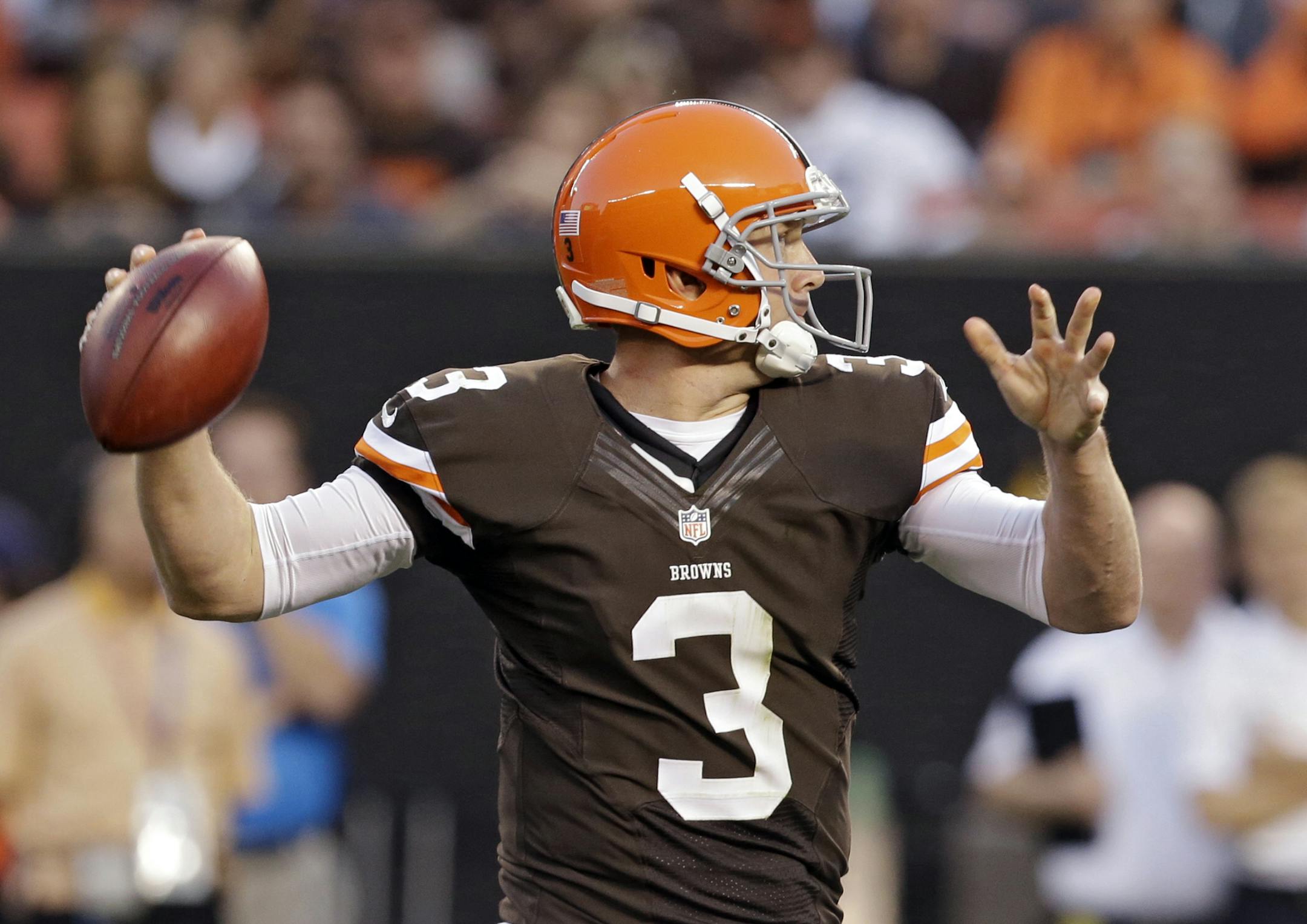 Cleveland Browns quarterback Brandon Weeden fires a 10-yard touchdown pass to Jordan Cameron in the first quarter of a preseason NFL football game against the Detroit Lions Thursday, Aug. 15, 2013, in Cleveland. (AP Photo/Tony Dejak) ORG XMIT: MIN2013082213065719