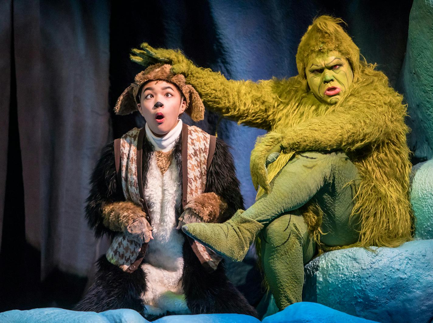 Natalie Tran as Young Max and Reed Sigmund as the Grinch in "Dr. Seuss' How the Grinch Stole Christmas!" at Children's Theatre Company.
credit: Dan Norman