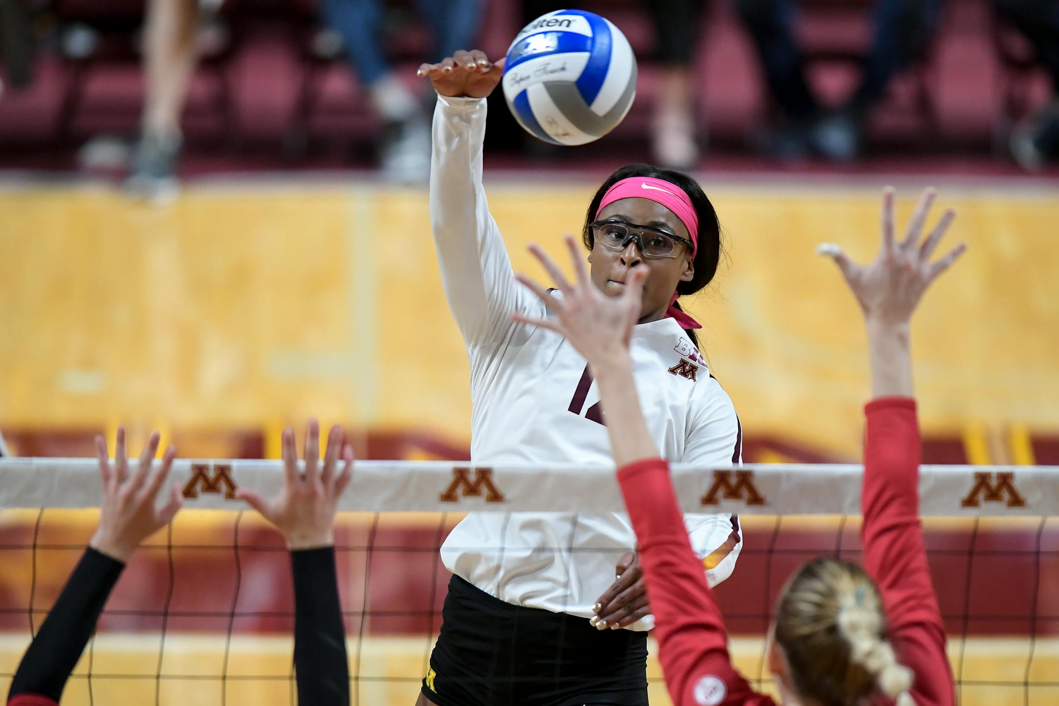 Gophers middle blocker Taylor Morgan spiked the ball against Indiana for a point in the first set.