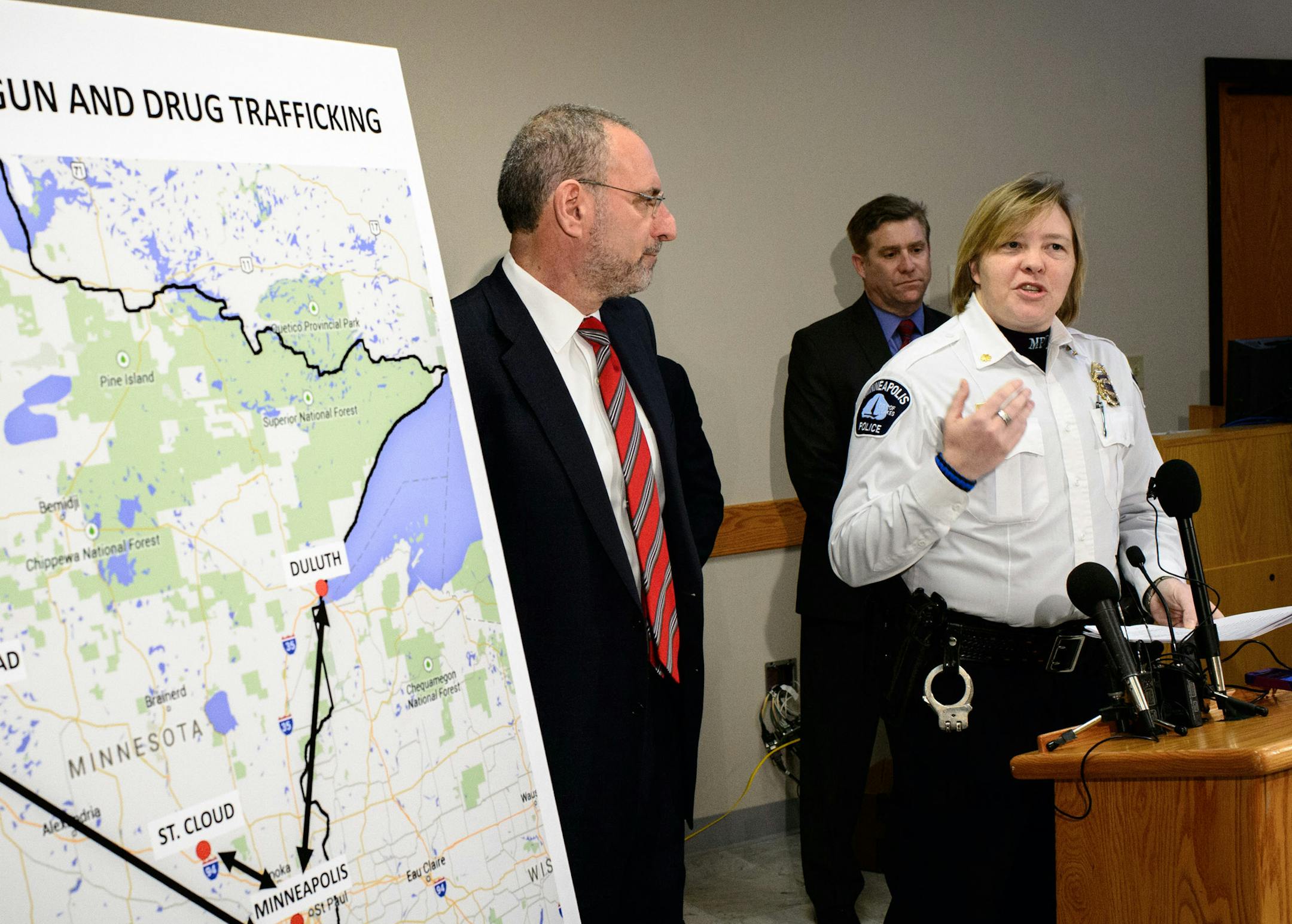 U.S. Attorney Andrew Luger and Minneapolis Police Commander Catherine Johnson announced federal drug trafficking charges filed against two north Minneapolis-based gangs. ] GLEN STUBBE * gstubbe@startribune.com Wednesday, March 4, 2015,