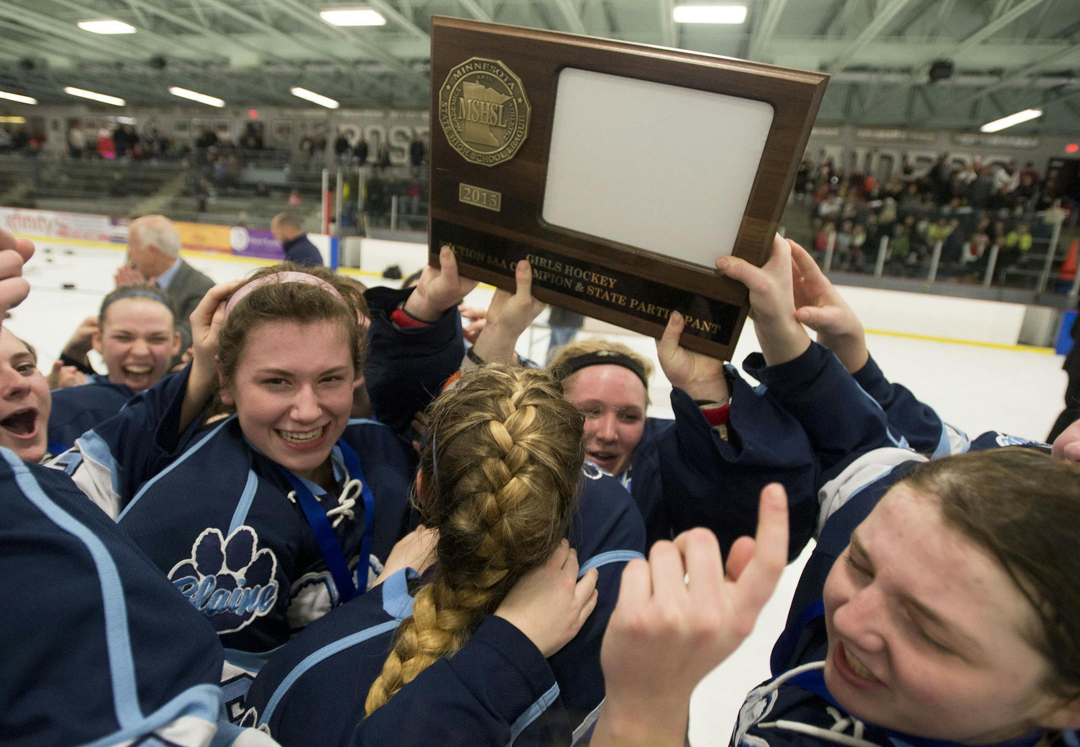 The Blaine girls’ hockey team celebrated its 3-2 victory over Centennial in the Section 5 final in Class 2A on Friday to qualify for the state tournament. (Aaron Lavinsky, Star Tribune)