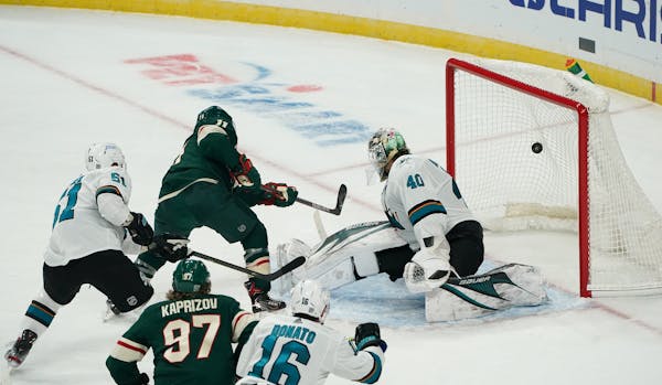 Wild forward Zach Parise scored his first goal of the season against Sharks goaltender Devan Dubnyk in the second period Friday at the Xcel Energy Cen