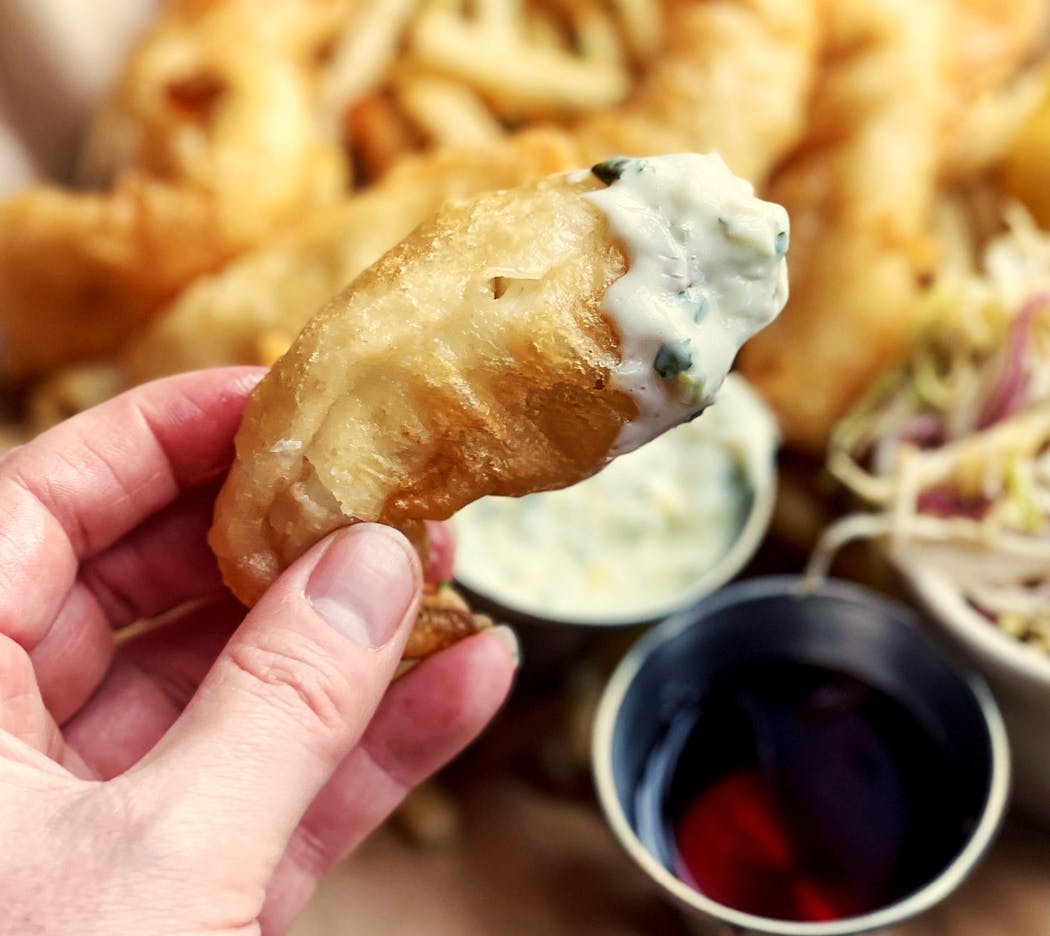 At the Lexington in St. Paul, fried cod is served with fries, coleslaw, tartar sauce and malt vinegar.