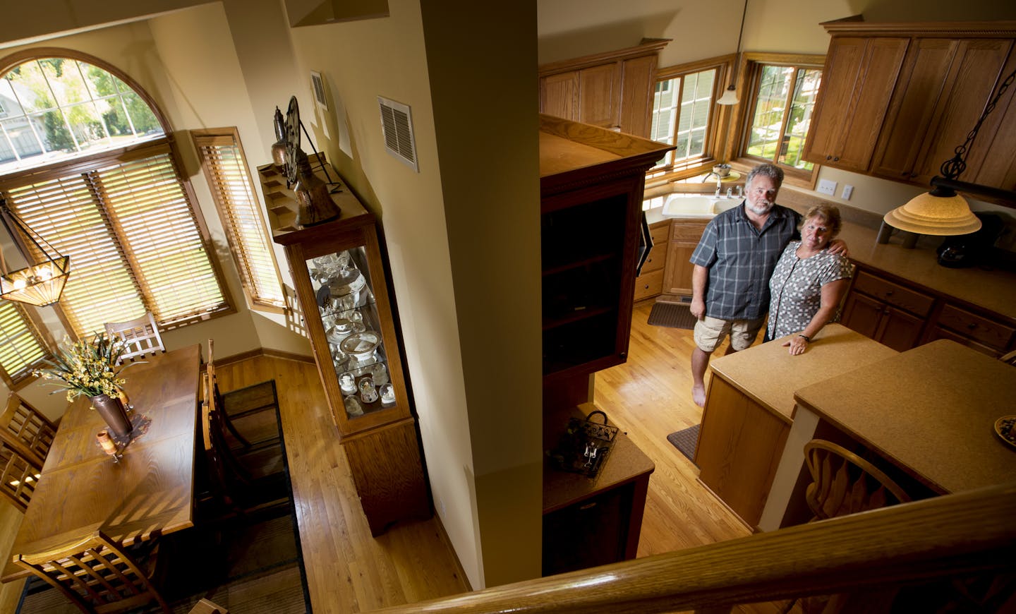 Mary and Mitchell Roach posed for a photograph in the open floor plan of their main floor on Tuesday, August 2, 2016, in Savage, Minn.] RENEE JONES SCHNEIDER &#x2022; renee.jones@startribune.com After putting their 4,000-plus square-foot house in Savage on the market in April, Mary and Mitchell Roach have done three price reductions and still no offers. Their neighbors were in the same boat and were so frustrated they took their house off the market.