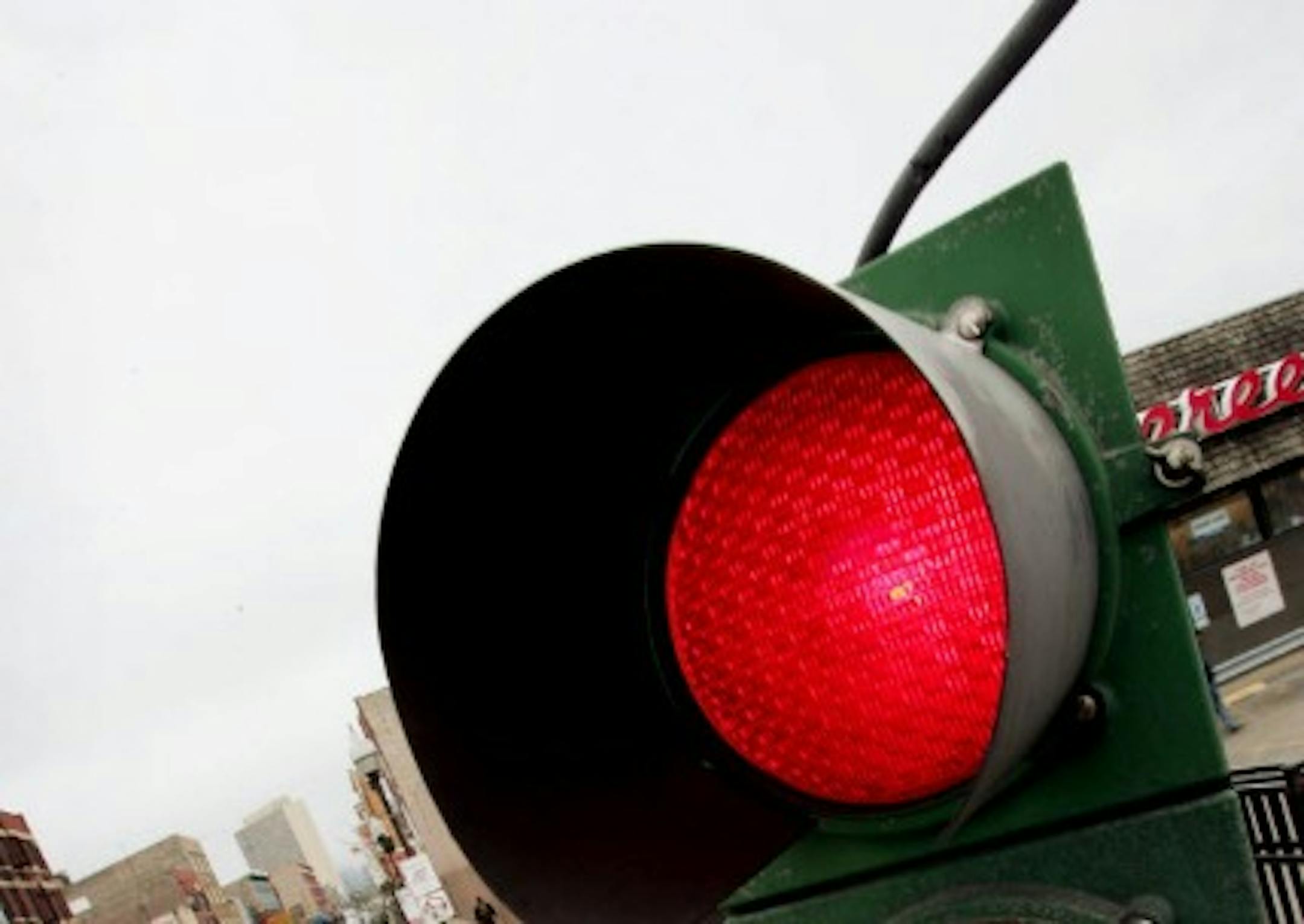 The red light of a traffic signal.