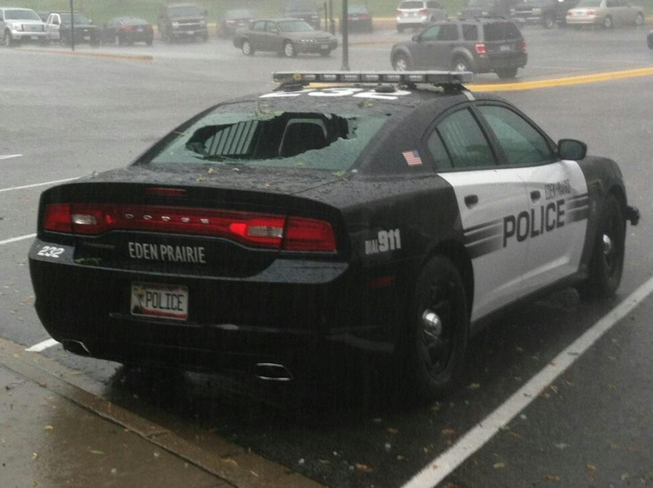 Eden Prairie Police tweeted a picture of one of their squad cars that had its rear window broken by hail that fell in Tuesday night's storm.