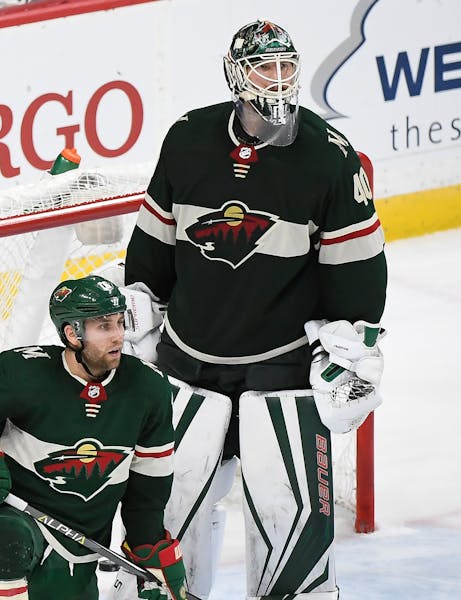 Minnesota Wild left wing Jason Zucker (16) and goalie Devan Dubnyk (40) looked on in disappointment after the game winning goal was scored early in ov