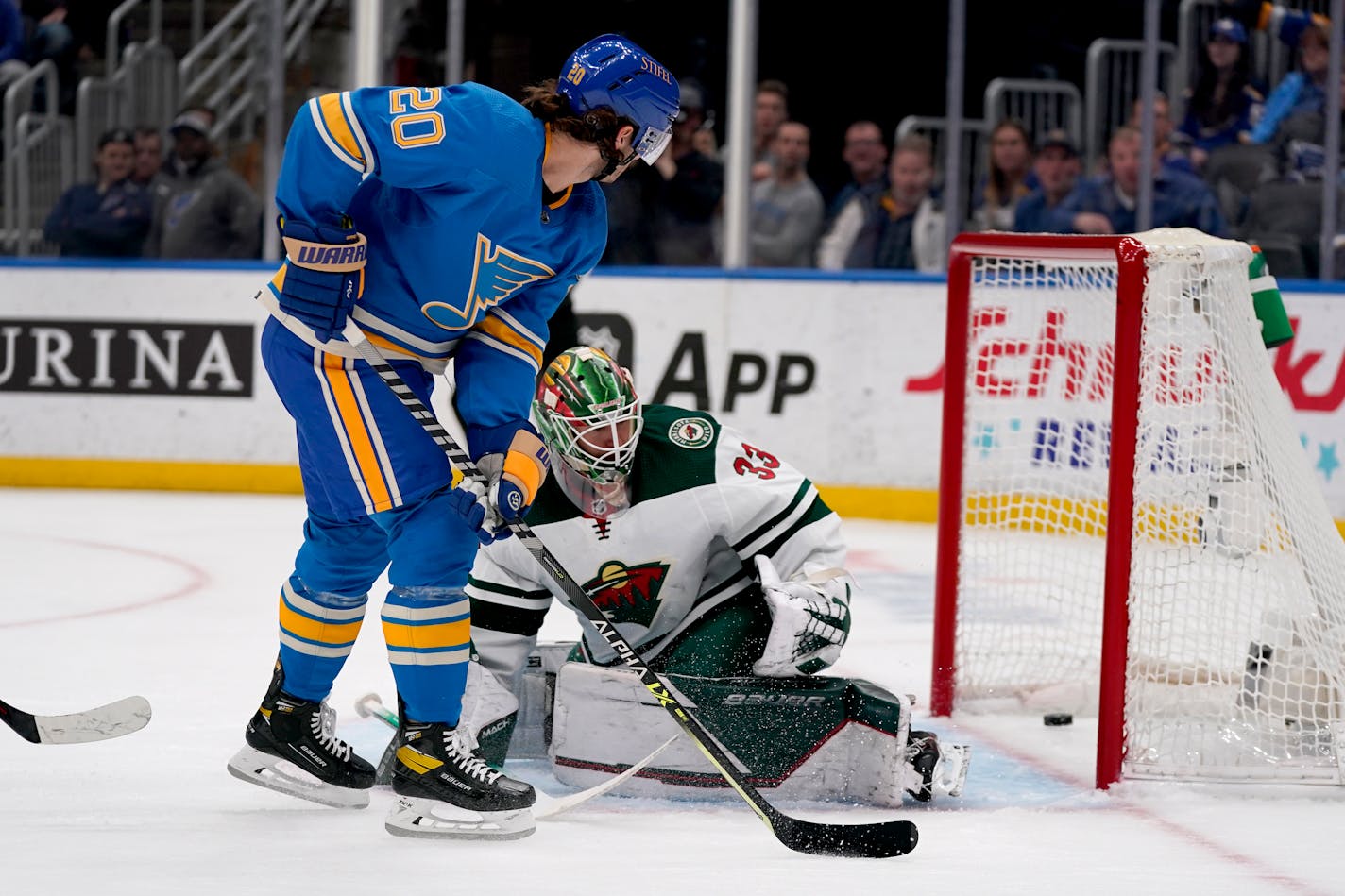 Brandon Saad scores past Wild goaltender Cam Talbot during the second period Saturday.