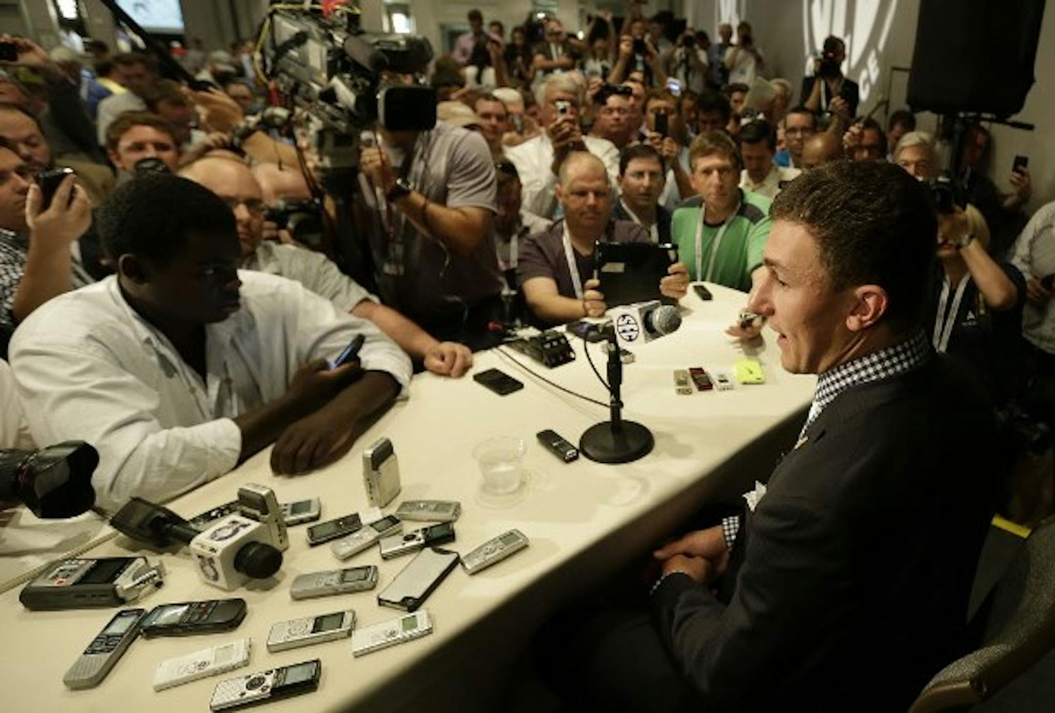 Here is Johnny Manziel at his sentencing ... er, SEC Media Day