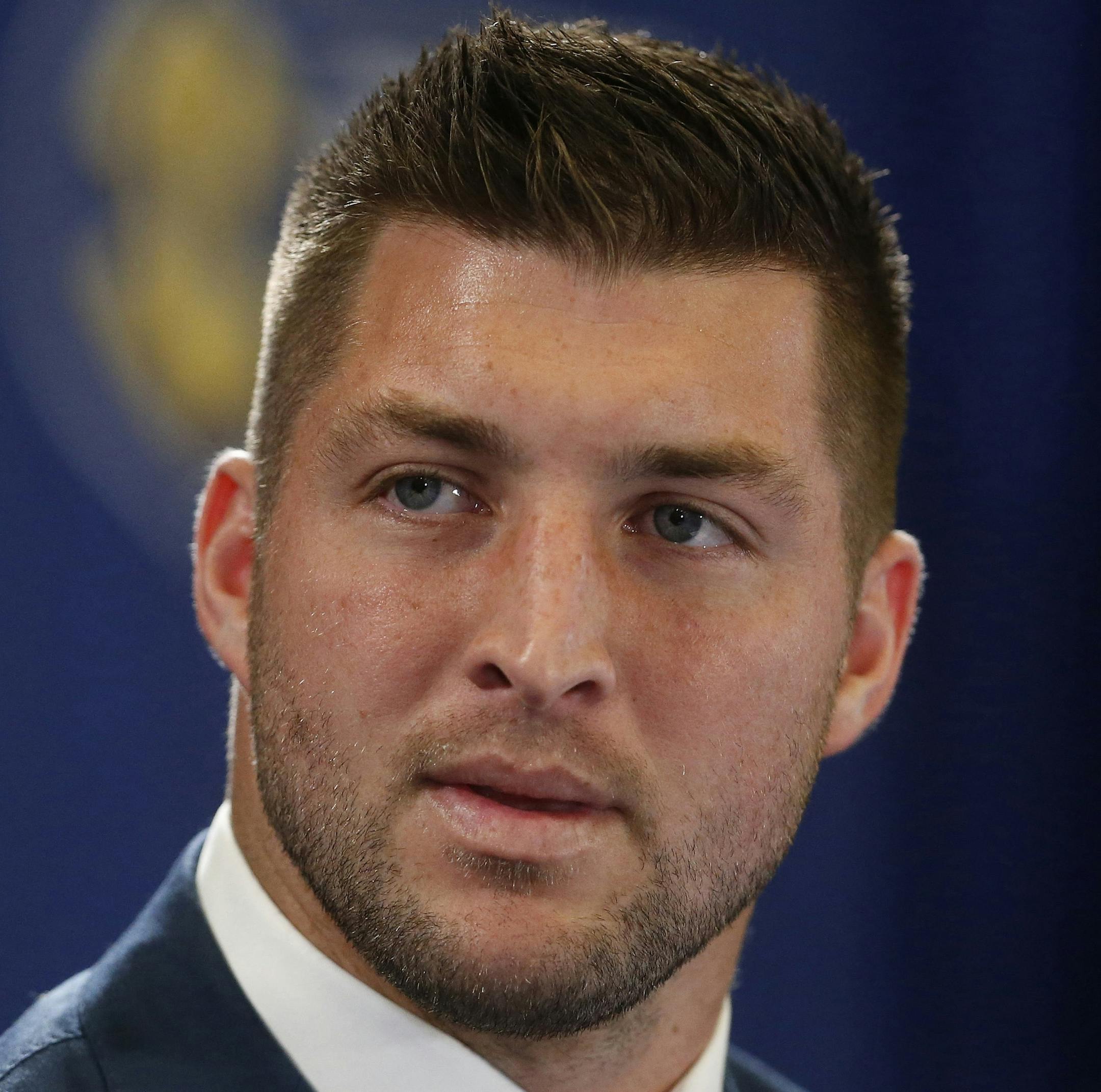 FILE - In this Dec. 5, 2014, file photo, Tim Tebow speaks during an SEC television broadcast in Atlanta. Tebow is expected to sign a one-year contract with the Philadelphia Eagles on Monday, April 20, 2015 according to three people familiar with the deal. (AP Photo/Brynn Anderson, File)