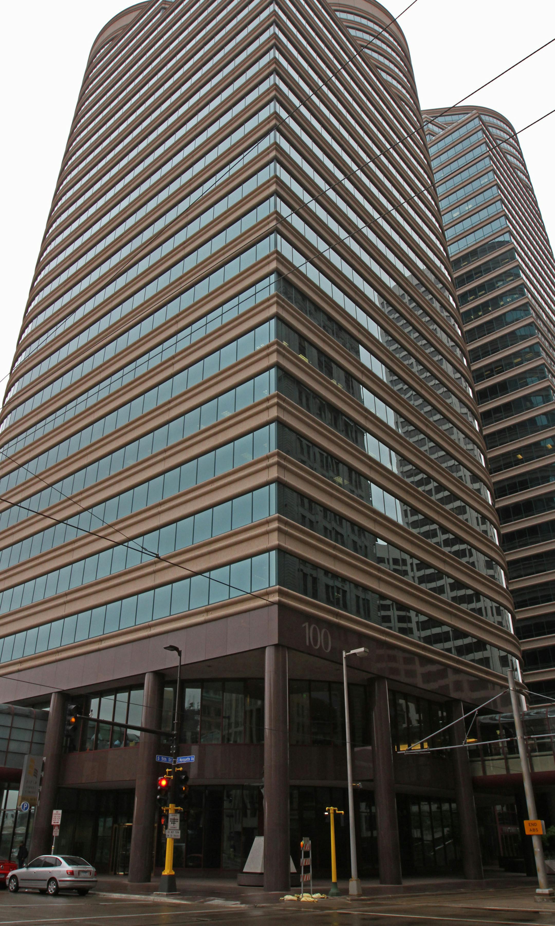 Exterior of Fifth Street Towers, photographed on 5/28/13. Feature on Fifth Street Towers for the Bricks & Mortar page. The towers, built in the 1980s, were sold last year at sheriff's auction. They've been renovated, and they secured the coveted LEED certification in the process. Last week, the Minneapolis law firm Moss & Barnett said it signed a long-term lease.] Bruce Bisping/Star Tribune bbisping@startribune.com