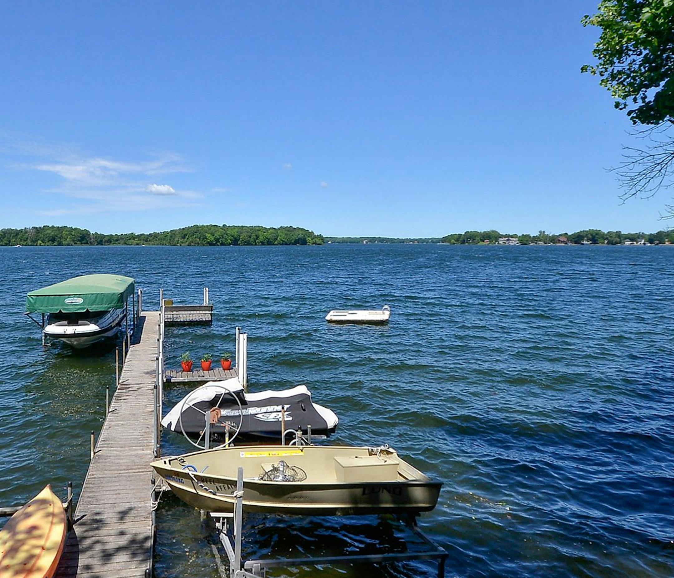 Lake view of Arts & Crafts home for sale on lake MInnetonka. provided by Coldwell Banker Burnet