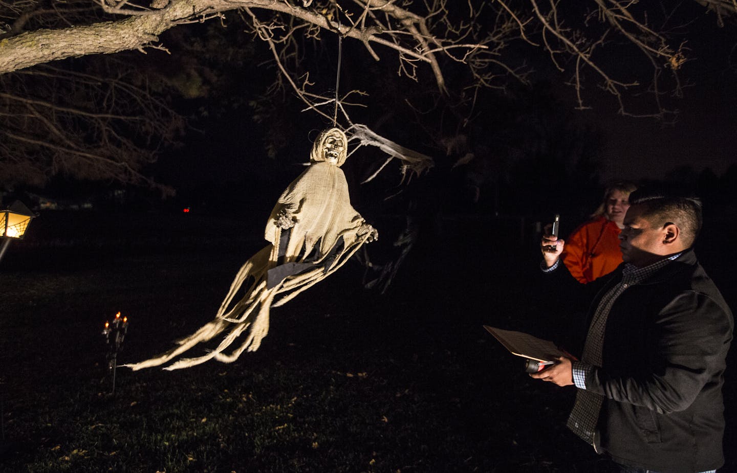 A haunting ghost blew in the wind on a tree at Darlene and Gerald Lazarz house on 157th Ave NW on Wednesday, October 22, 2014 in Anoka, Minn. Fourteen families are competing in the city of Anoka's annual Halloween outdoor decorating contest. ] RENEE JONES SCHNEIDER &#x2022; reneejones@startribune.com