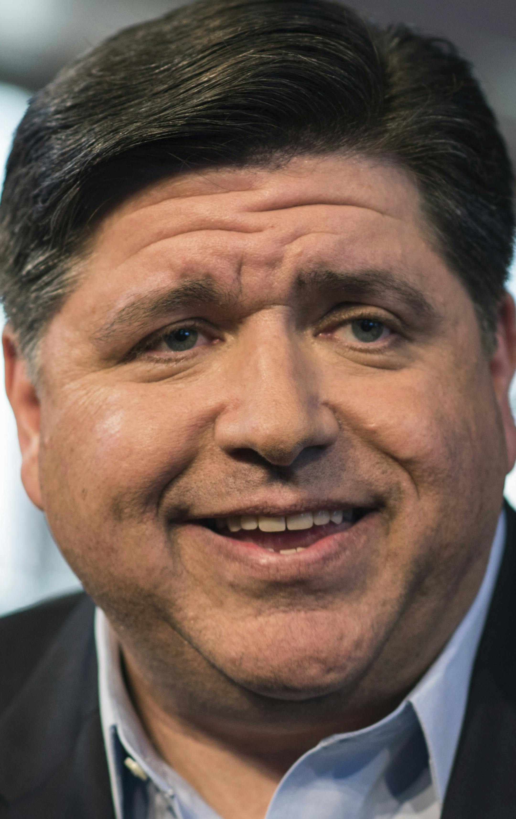 FILE - In this April 6, 2017, file photo, J.B. Pritzker speaks with the media after announcing his run for Illinois governor in Chicago. The 2018 Illinois governor's race is on pace to be the most expensive in U.S. history, propelled by a wealthy Republican incumbent and a billionaire Democrat. Pritzker, one of the world's richest people, is among several Democrats trying to defeat multimillionaire Gov. Bruce Rauner. (Max Herman /Chicago Sun-Times via AP, File)