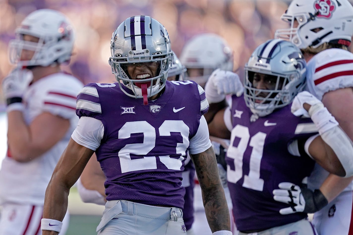 Kansas State cornerback Julius Brents (23) celebrate after making a tackle during the first half of an NCAA college football game against South Dakota Saturday, Sept. 3, 2022, in Manhattan, Kan. (AP Photo/Charlie Riedel)