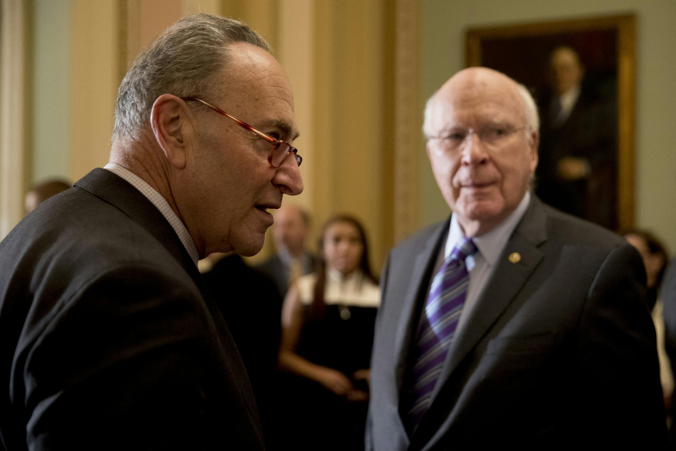 From left, Senate Minority Leader Sen. Chuck Schumer of N.Y., and Sen. Patrick Leahy, D-Vt., arrive for a news conference following a Senate policy luncheon after House and Senate negotiators worked out a border security compromise hoping to avoid another government shutdown on Capitol Hill, Tuesday, Feb. 12, 2019, in Washington. (AP Photo/Andrew Harnik)