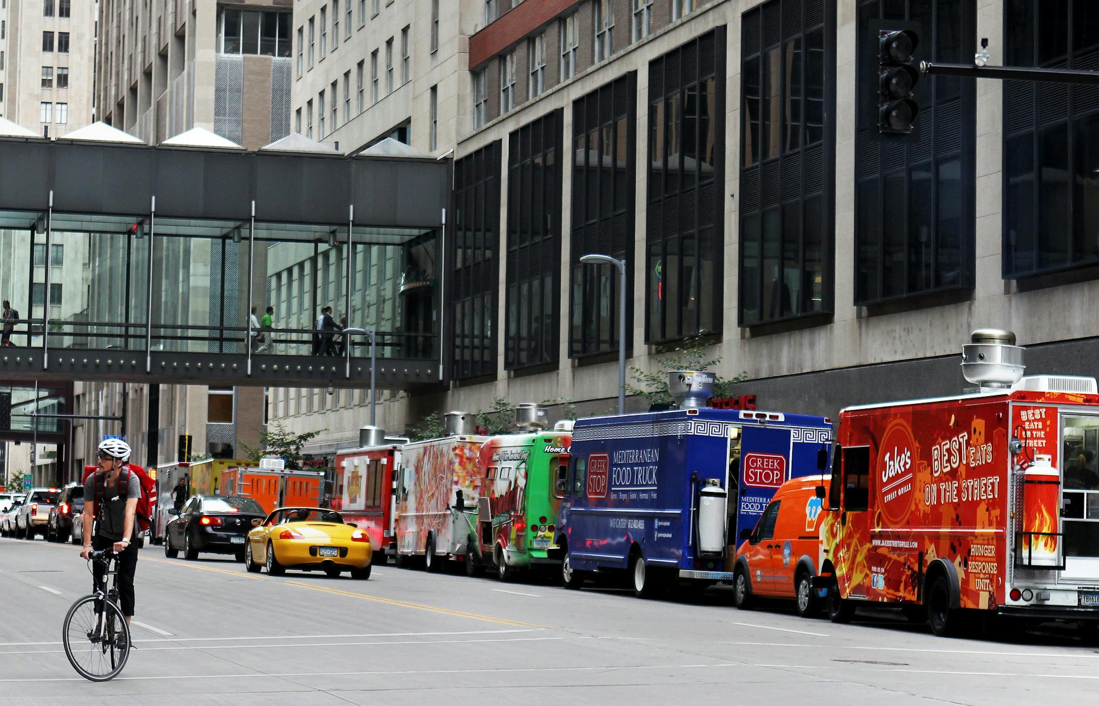 Food trucks line up on Marquette St. in downtown Minneapolis, Minn., on Wednesday, July 24, 2013. ] (ANNA REED/STAR TRIBUNE) anna.reed@startribune.com (cq) ORG XMIT: MIN1307241428321983