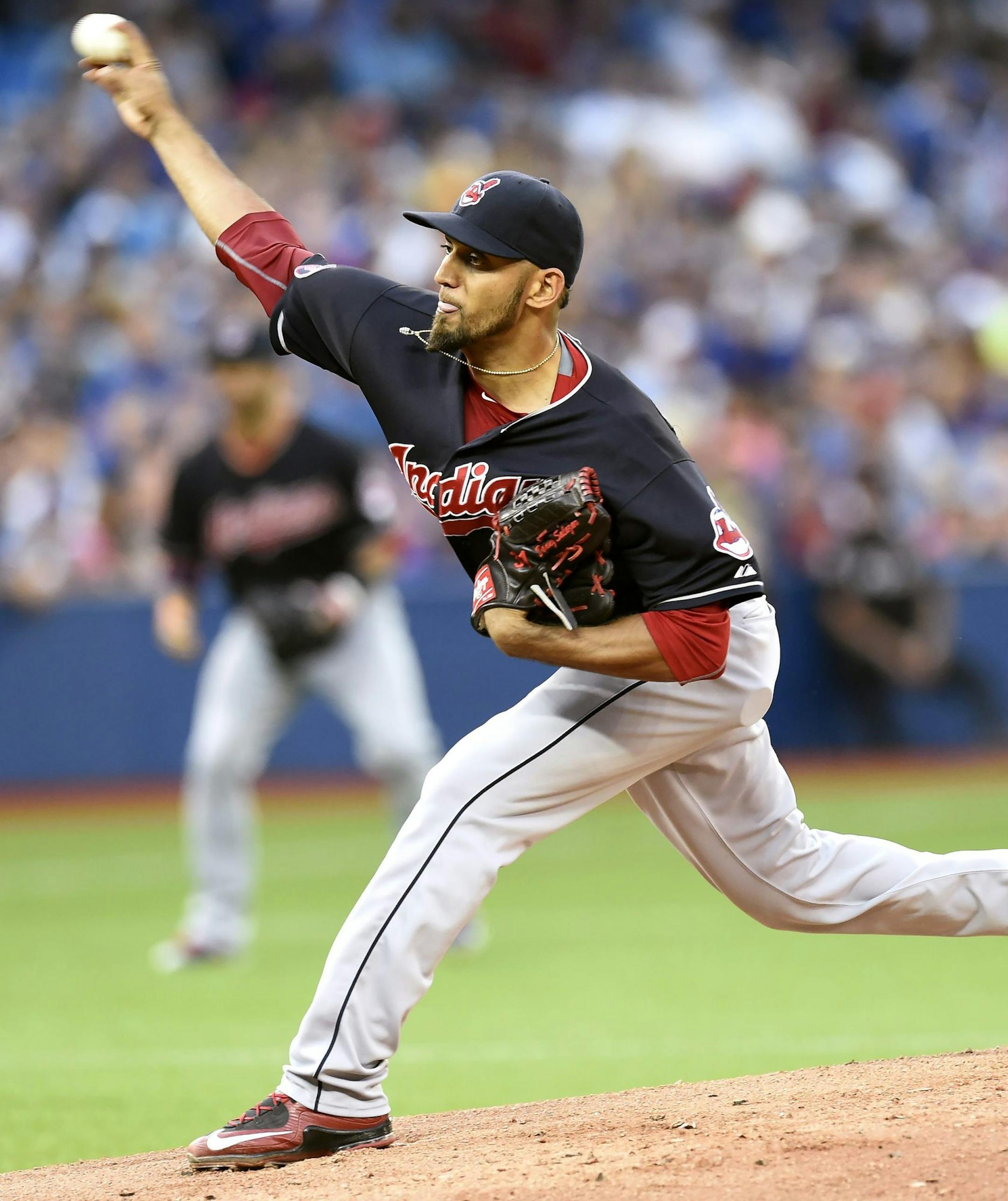 Cleveland Indians' starting pitcher Danny Salazar works against the Toronto Blue Jays during the first inning of a baseball game, Monday, Aug. 31, 2015 in Toronto. (Frank Gunn/The Canadian Press via AP) MANDATORY CREDIT