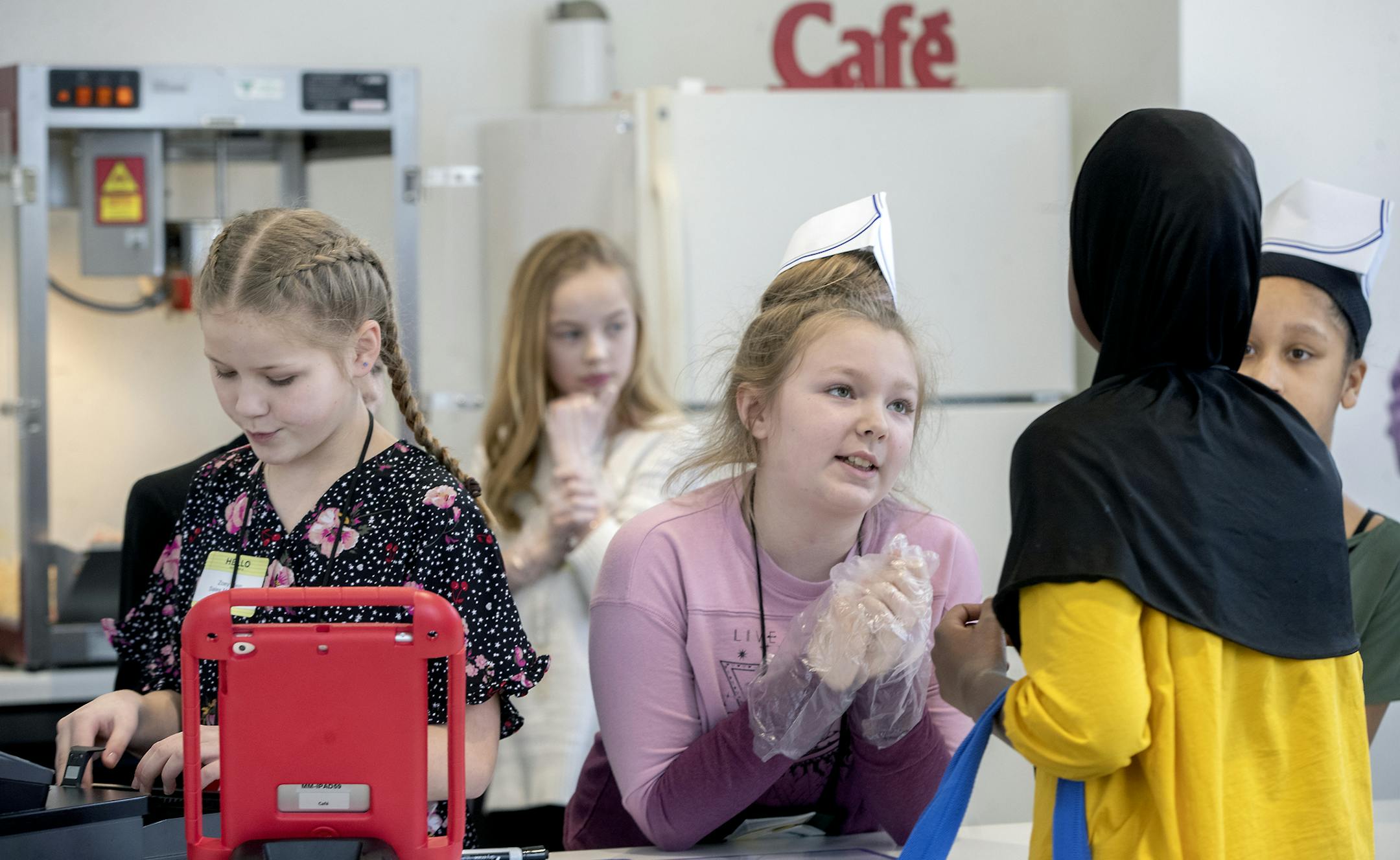 Rosemount Elementary fifth-graders learned to run a small cafe at Junior Achievement's "BizTown," Monday, February 4, 2019 in St. Paul, MN. The "BizTown" is a make-believe city with 18 storefronts. Before arriving, children apply and interview for jobs and then execute them. They take out loans from the bank, make purchases and tally sales at their shops. The center is part of Junior Achievement's new $20 million learning center. ] ELIZABETH FLORES &#x2022; liz.flores@startribune.com