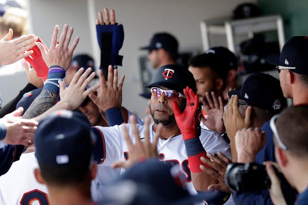 Twins designated hitter Nelson Cruz celebrates in the dugout after hitting a two-run home run on Monday in Florida. He went yard again on Wednesday.