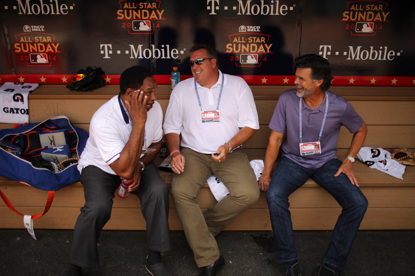 Former Twins Kent Hrbek, and Rick Aguilera, right, reacted to a story told by Dave Winfield as they relaxed in the dugout before the Futures Game Sunday afternoon. ] JEFF WHEELER • jeff.wheeler@startribune.com The Futures Game kicked off the All-Star week baseball activities Sunday afternoon, July 13, 2014 at Target Field in Minneapolis.