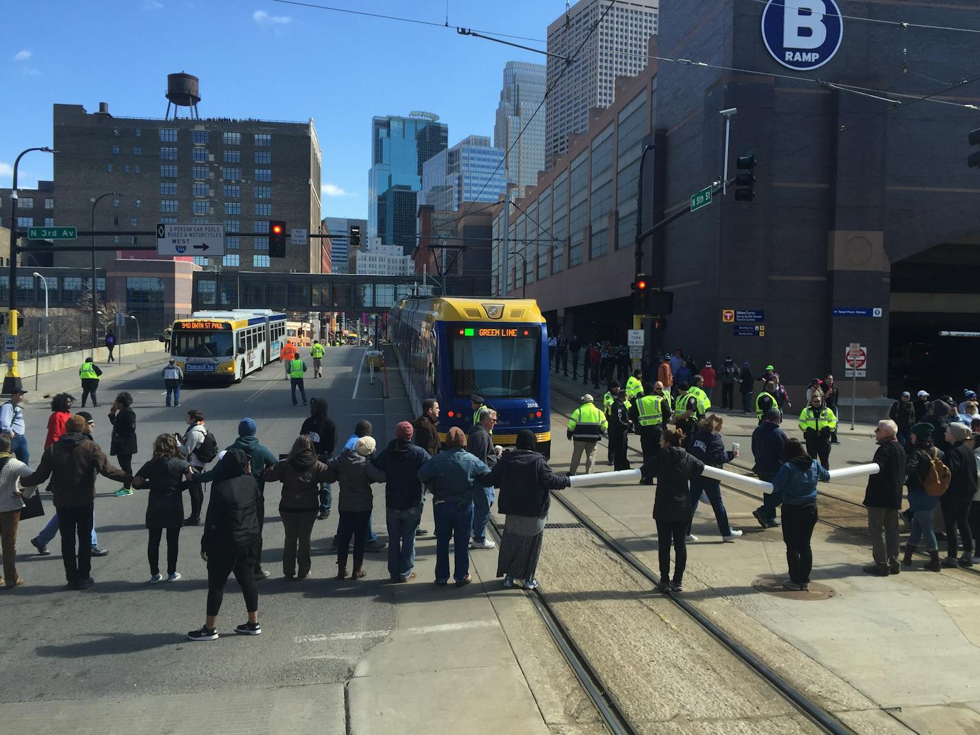 Black Lives Matter protesters block the light rail train Monday before the start of the Twins-White Sox game.