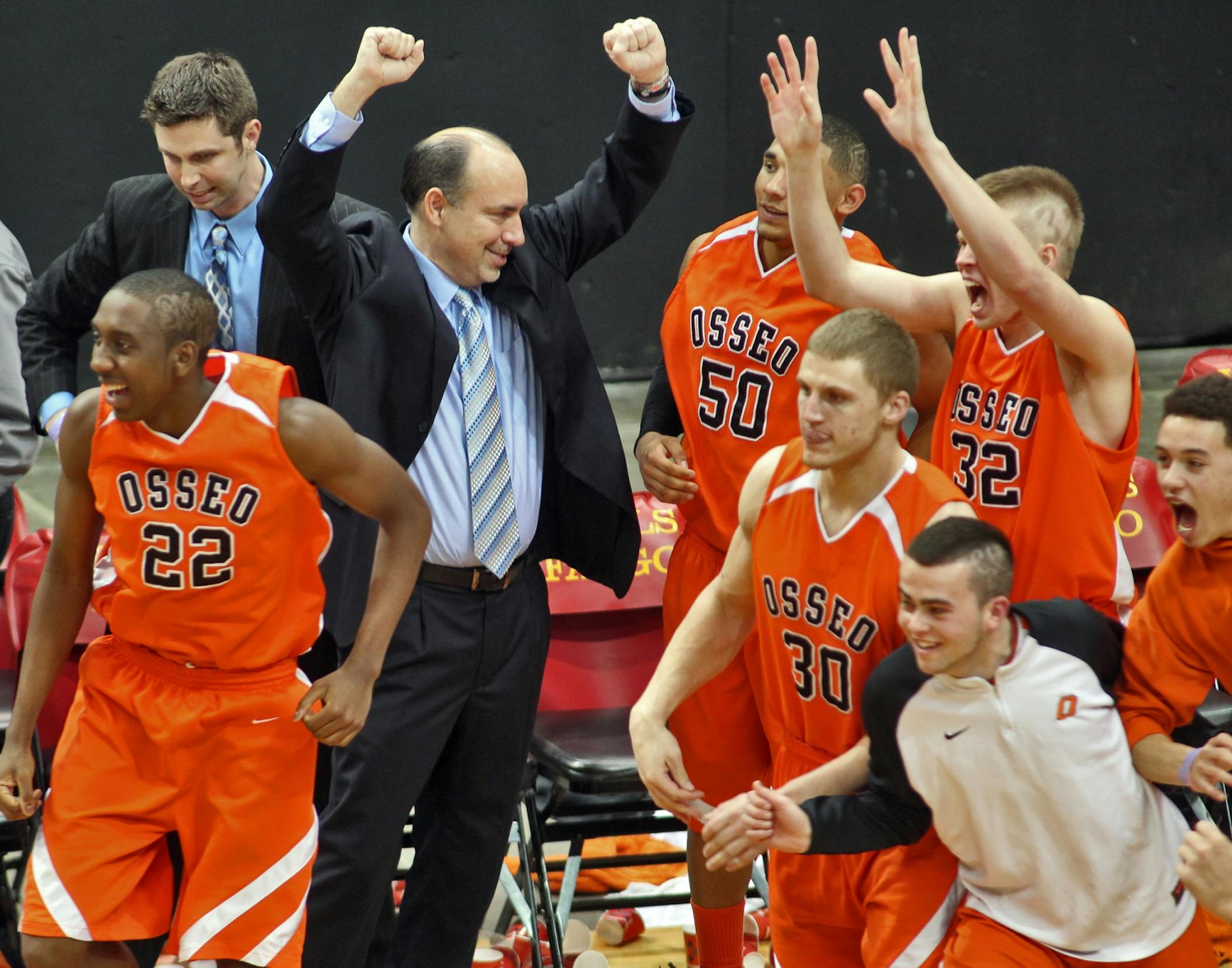 Osseo coach Tim Theisen celebrated his team's victory at the final horn. Hopkins lost for only the second time this season.