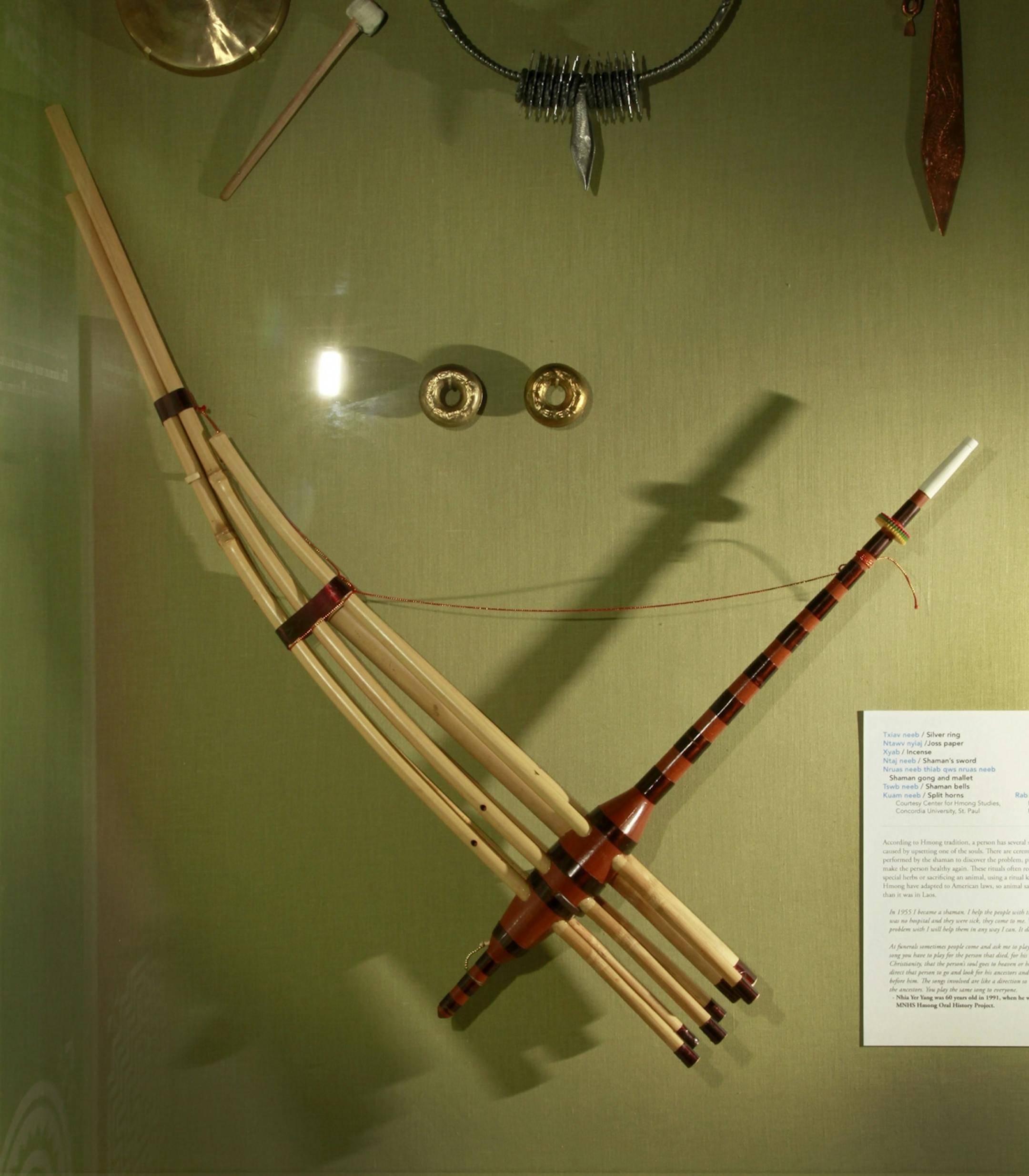 Hmong in Minnesota exhibit at the Minnesota History Center - artifact - a traditional wood wind musical instrument -Qeej musical instrument, courtesy Minnesota Historical Society