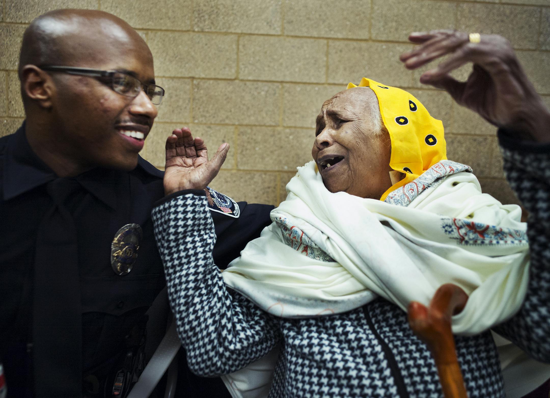Columbia Heights police's first Ethiopian officer Hashim Abdullahi was congratulated by his proud grandmother, Kemero Keiro .] Richard Tsong-Taatatarii@startribune.com