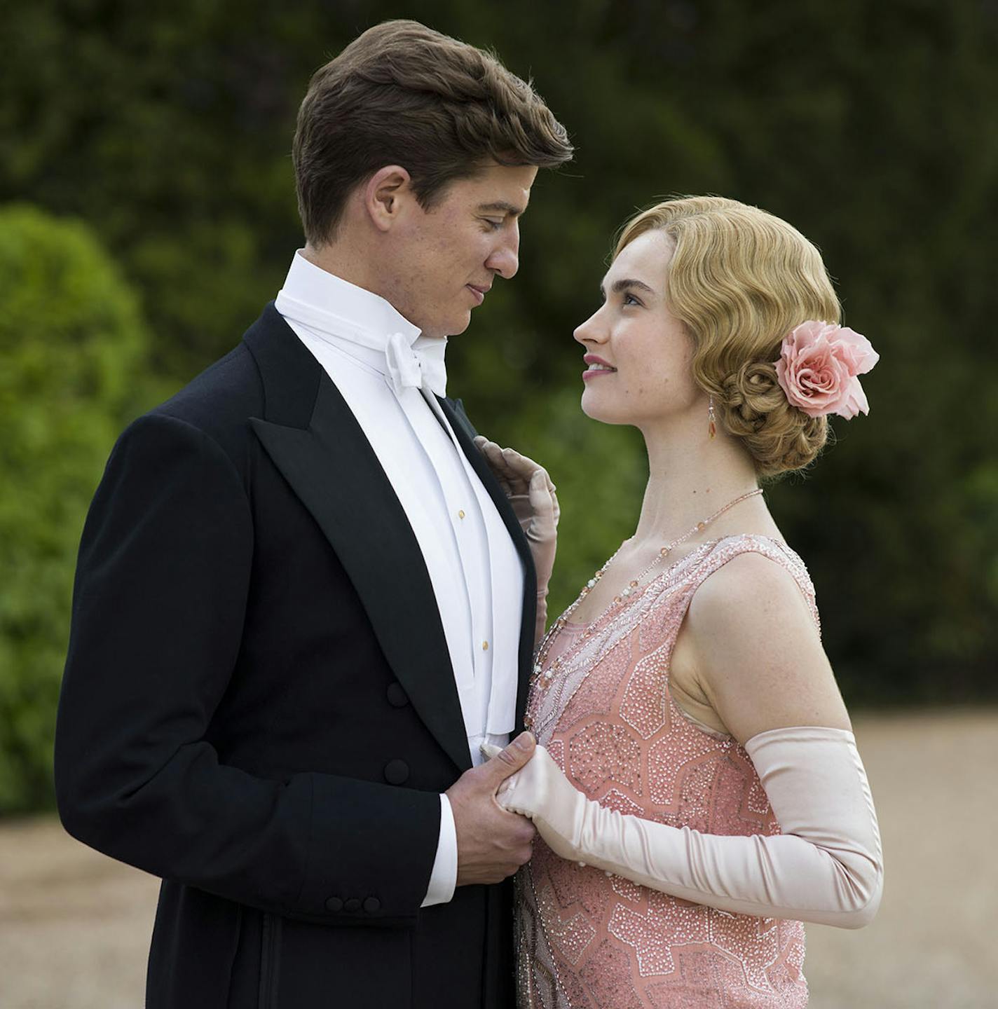 Downton Abbey Season 5 on MASTERPIECE on PBS Shown from left to right: Matt Barber as Atticus and Lily James as Lady Rose (C) Nick Briggs/Carnival Films 2014 for MASTERPIECE