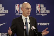 FILE - In this Oct. 8, 2019, file photo, NBA Commissioner Adam Silver speaks at a news conference before an NBA preseason basketball game between the 