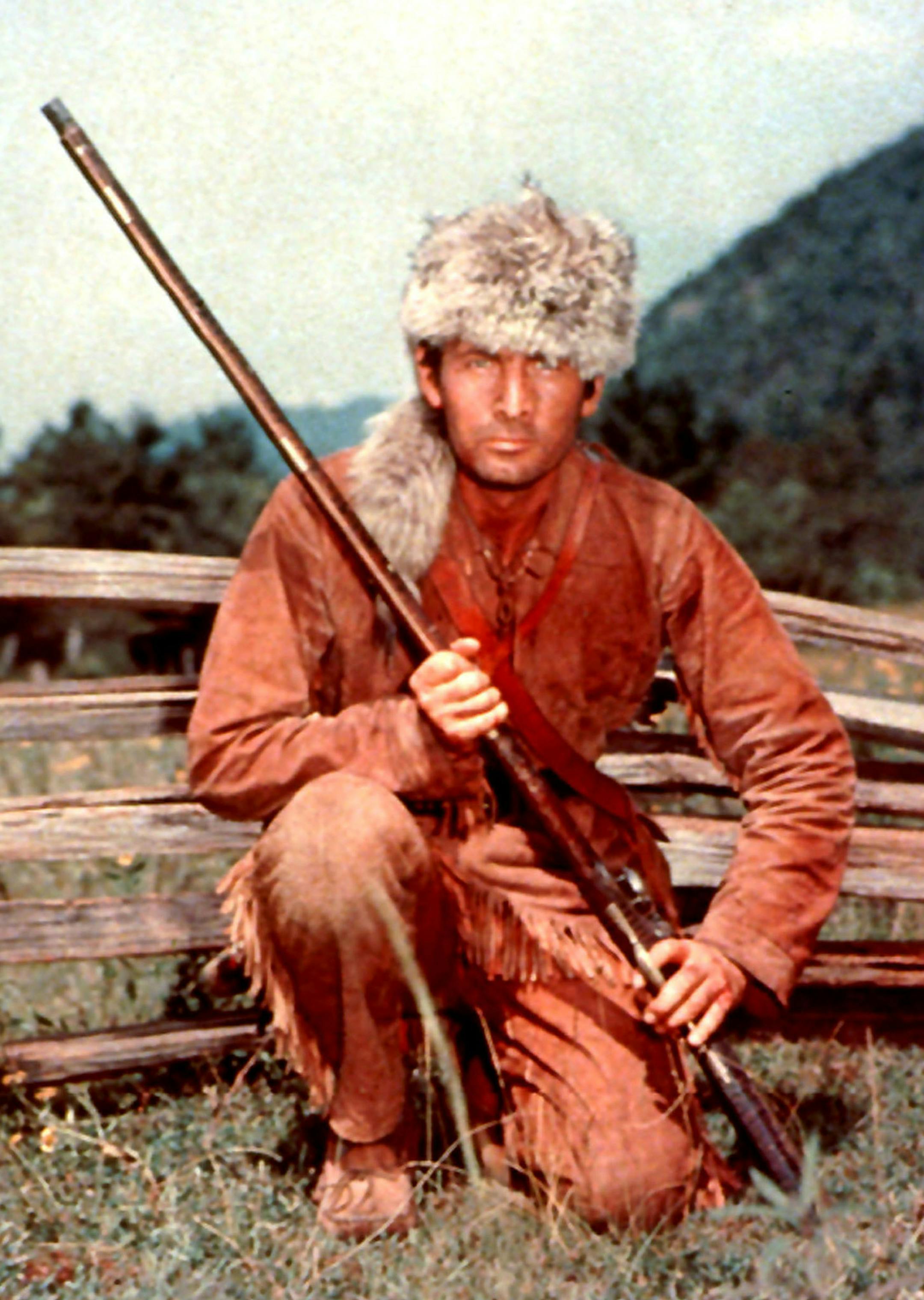 *FILE PHOTO*, *MAGS OUT/NO SALES* -- Fess Parker as Davy Crockett in an undated photo. Parker, whose television portrayal of Davy Crockett, the American frontiersman, catapulted him to stardom in 1954-55 and inspired one of America's greatest merchandising fads, in which hundreds of thousands of children wore coonskin caps, died on Thursday, March 18, 2010. Parker, who went rustic once again in the 1960s and played Daniel Boone for a new generation of young television watchers, was 85. (Disney v