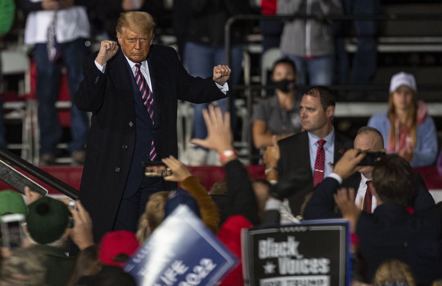 President Trump danced down the catwalk to "YMCA" as his supporters cheered him on at a campaign rally in Bemidji, Minn. on Friday, September 18, 2020.