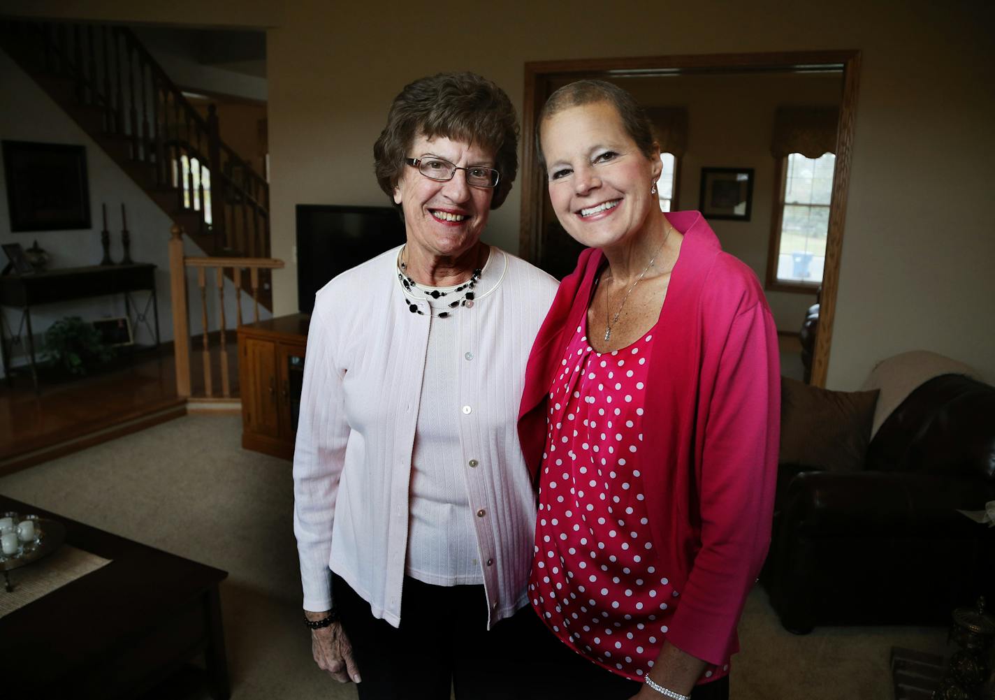 Charlotte Thompson left and her daughter Suzanne Storbeck both are struggling with cancer, and using their battle to educate and inspire others Wednesday October 29 , 2014 in Maple Grove ,MN. ] Jerry Holt Jerry.holt@startribune.com