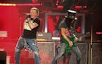 FILE - Guns N' Roses' Axl Rose, left, and Slash perform on the first weekend of the Austin City Limits Music Festival on Oct. 4, 2019, in Austin, Texa