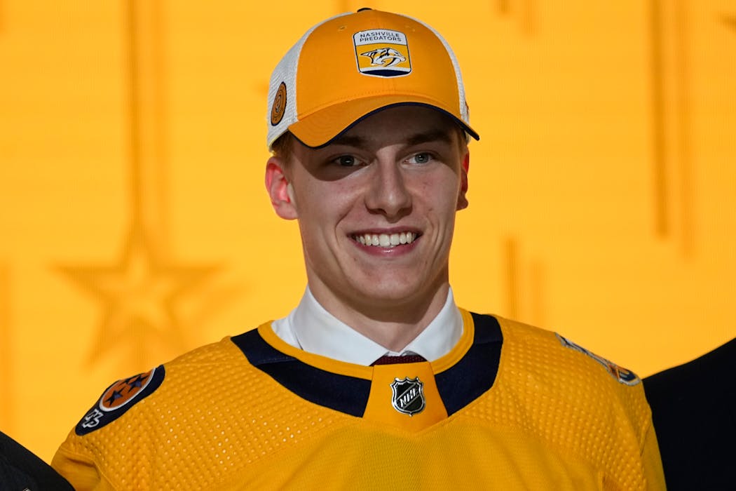 Matthew Wood smiles after the Predators made him the No. 15 overall pick in last year's NHL draft, which was held in Nashville.