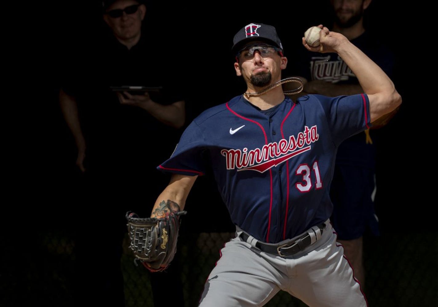 Twins pitcher Devin Smeltzer threw in the bullpen during a spring training workout.